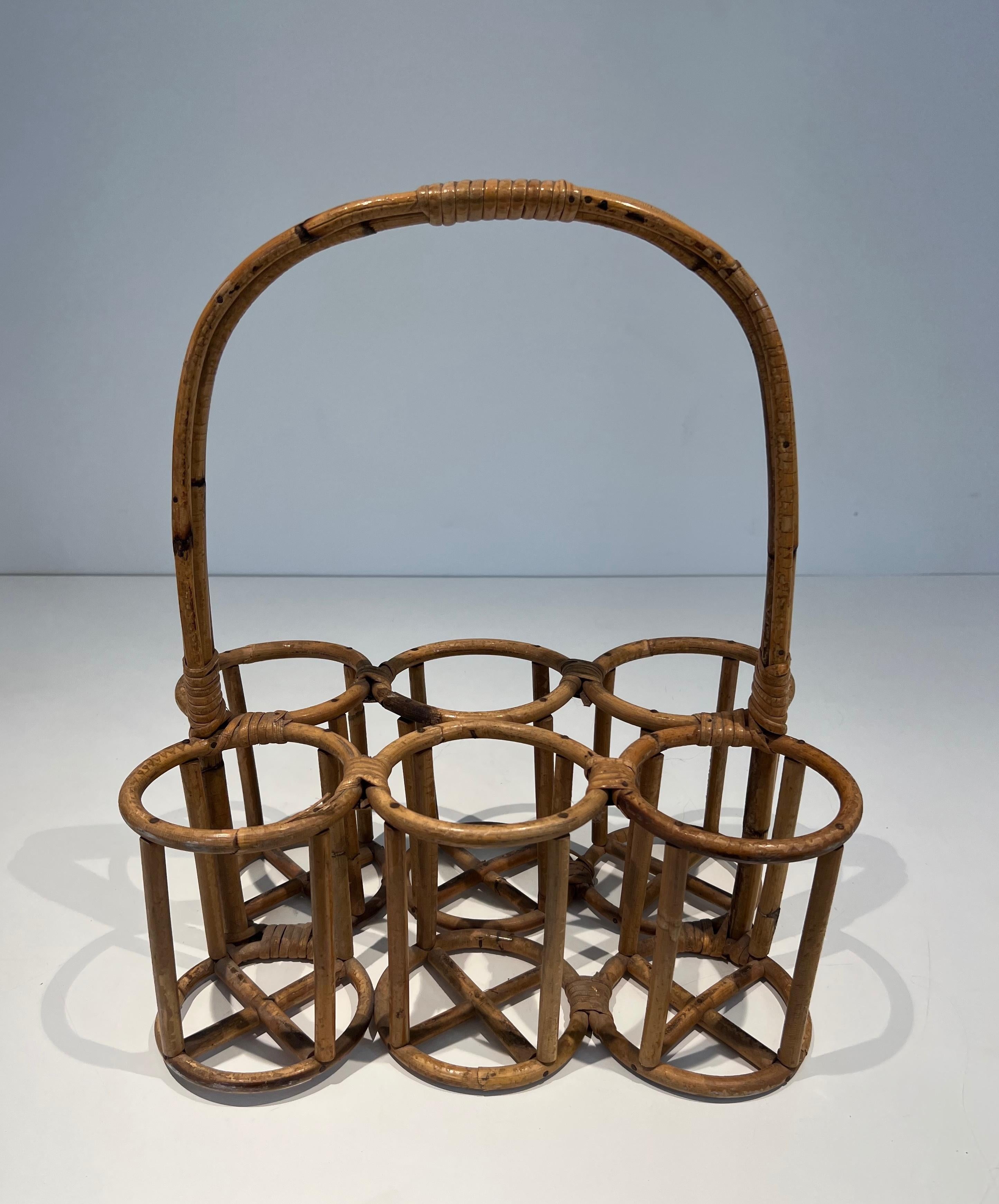Mid-Century Modern Rattan bottles holder. French work. Circa 1950 For Sale