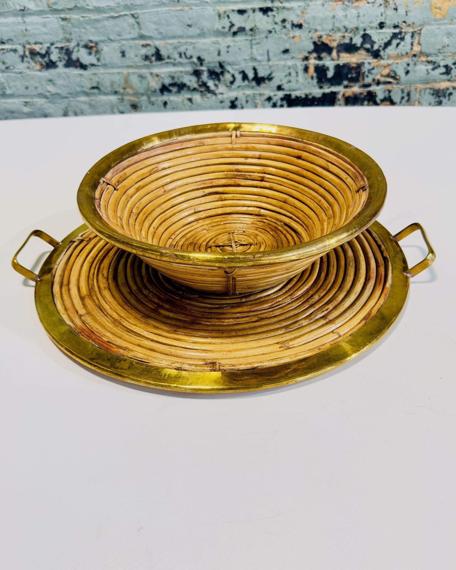 Rattan and Brass Tray and Bowl, Style of Gabriella Crespi, Italy 1970.
Amazing rattan brass tray and bowl with brass trim and handles on the tray. Made of weaved, woven rattan, wicker, bamboo and brass rims and handles.