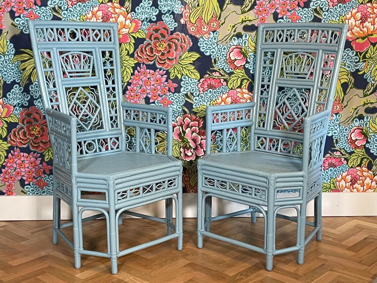 Pair of rattan high back arm chairs feature Chinese chippendale fretwork in the Brighton pavilion style. Finished in gloss lacquer, color is Sherwin Williams #2344 