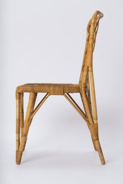Rattan Chair with Braided Back in the style of Louis Sognot - France 1960's