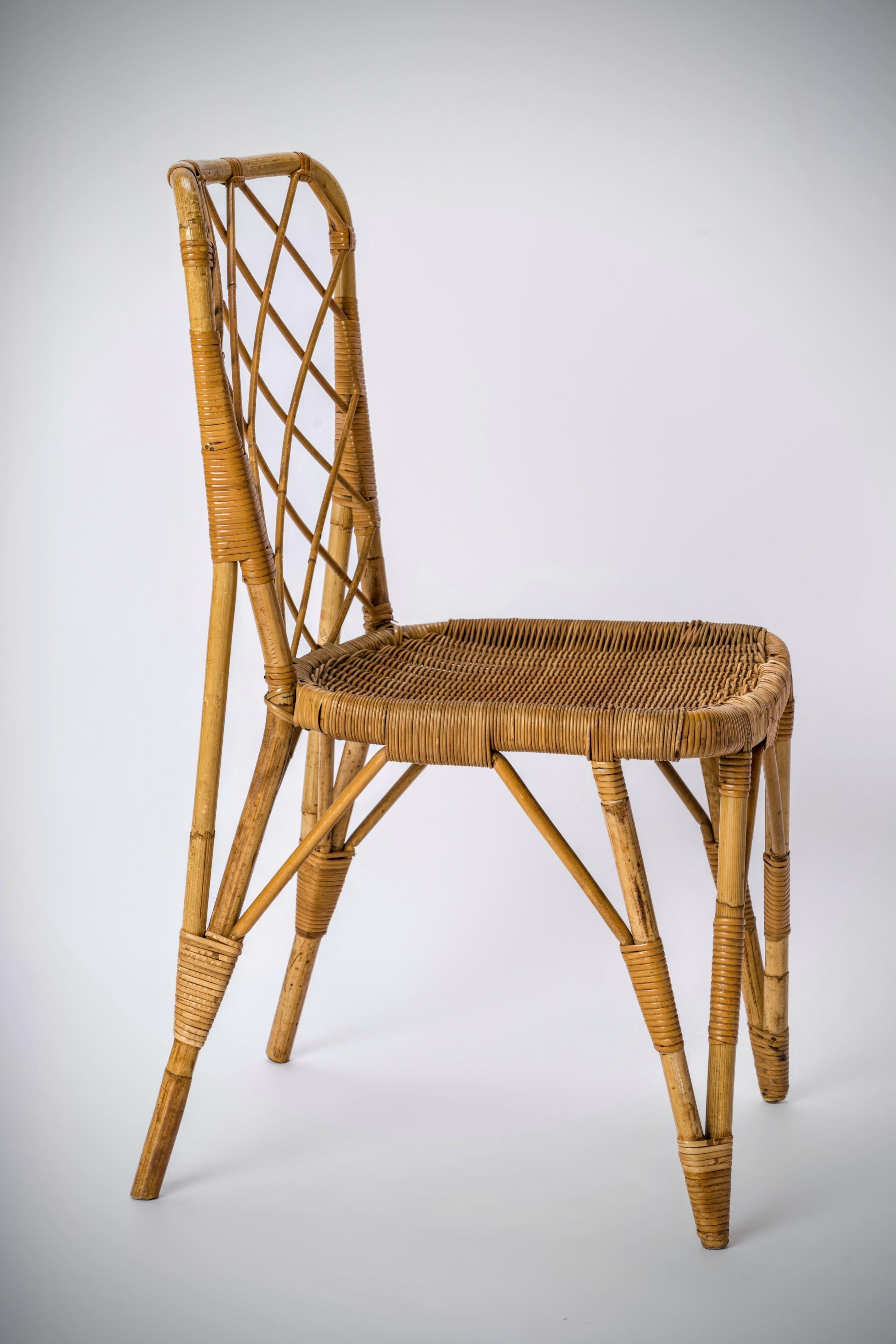 Rattan Chair with Braided Back in the style of Louis Sognot - France 1960's In Good Condition For Sale In New York, NY