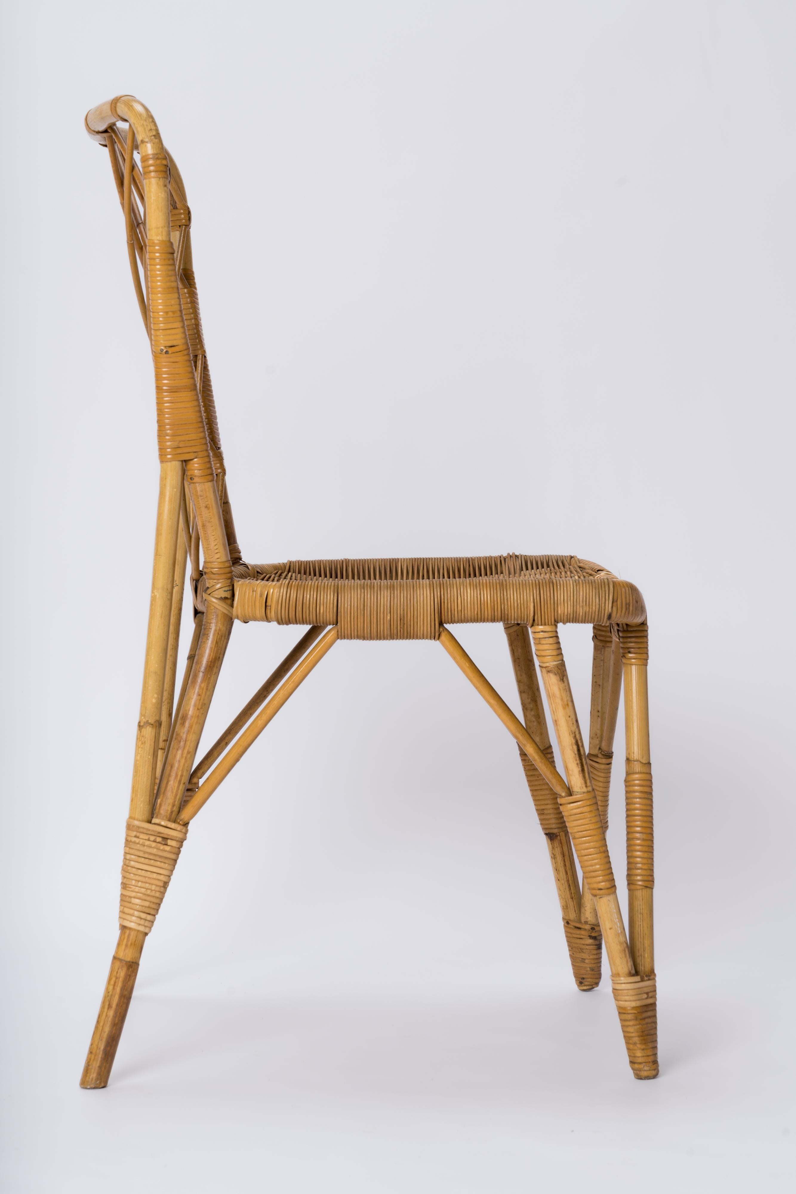 Mid-20th Century Rattan Chair with Braided Back in the style of Louis Sognot - France 1960's For Sale