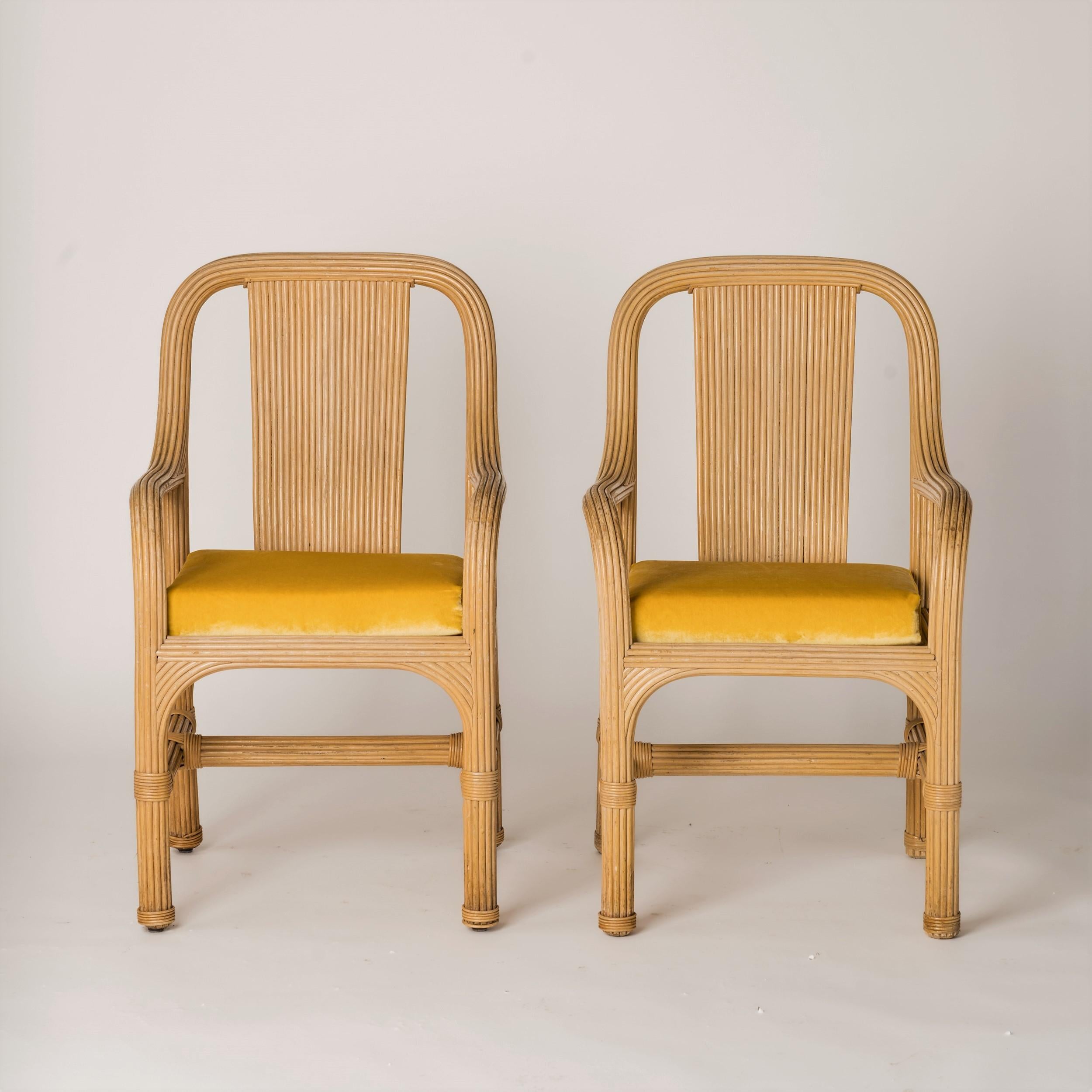 Graphic pair of rattan chairs attributed to ViVaï del Sud. In good vintage condition. 
