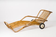 Rattan "Chaise-Longue" Pool Lounger With Original Rubber Casters - France 1950's