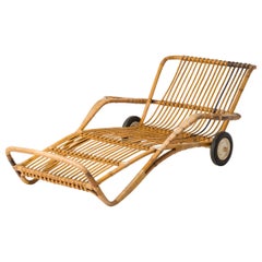 Rattan "Chaise-Longue" Pool Lounger With Original Rubber Casters - France 1950's