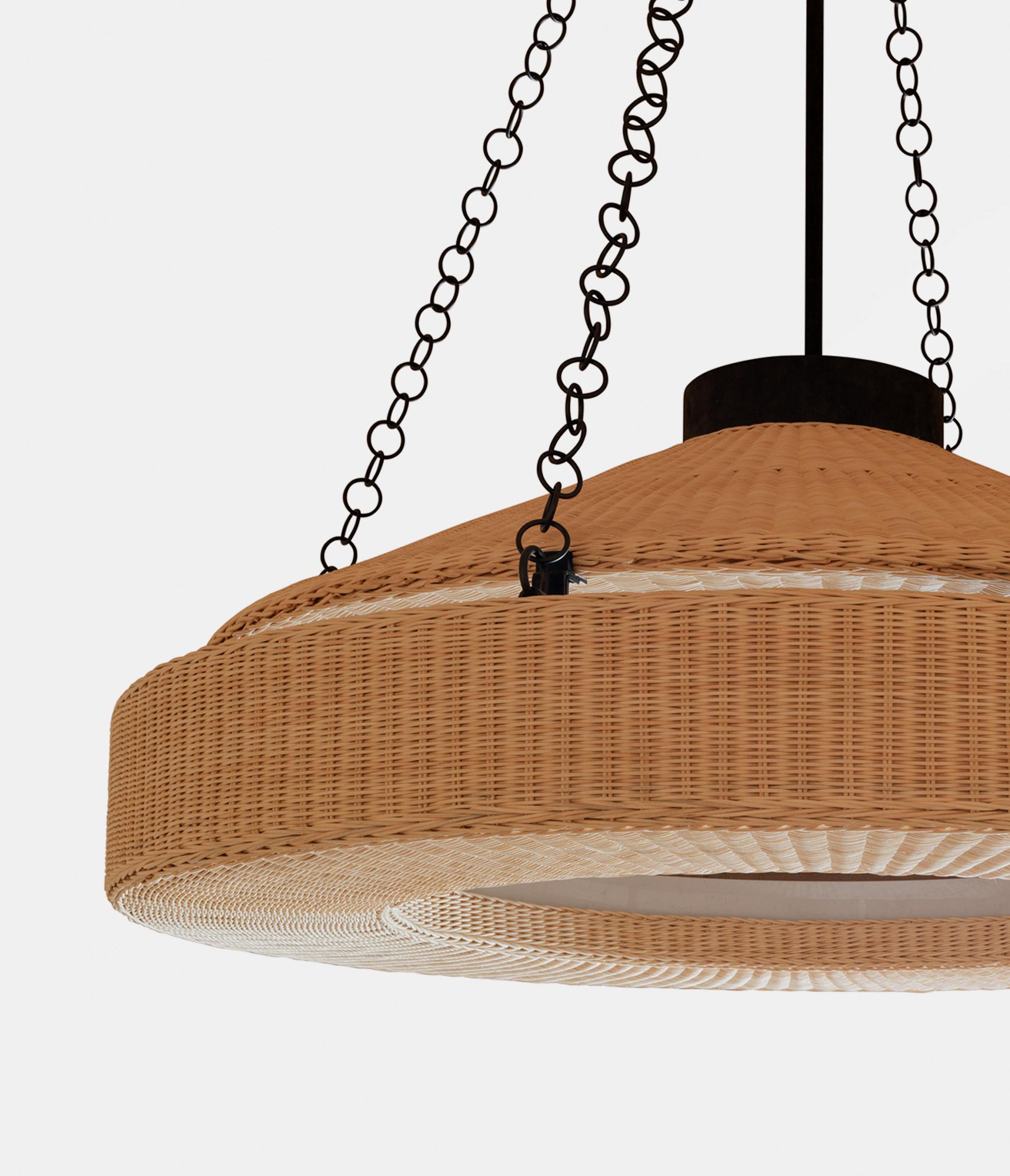 Orion Chandelier -- Stephane Parmentier x Giobagnara

Features woven rattan with burnished bronze suspension chains. Suspensions' length adjustable on request.

Embracing sleek designs and beautiful materials, the Stephane Parmentier Collection for