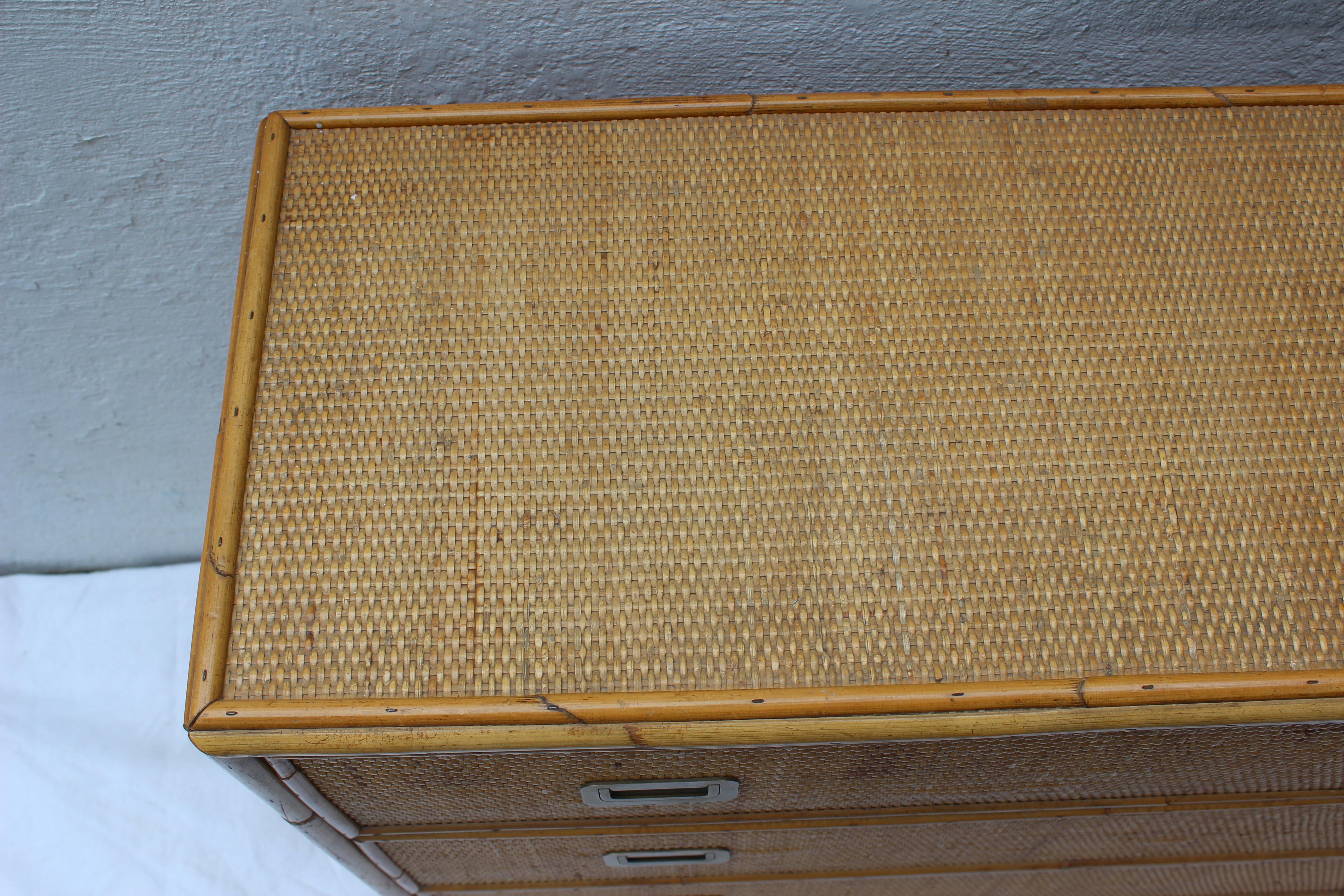 Great looking rattan 3-drawer chest with Campaign style pulls....a nice small scale piece.