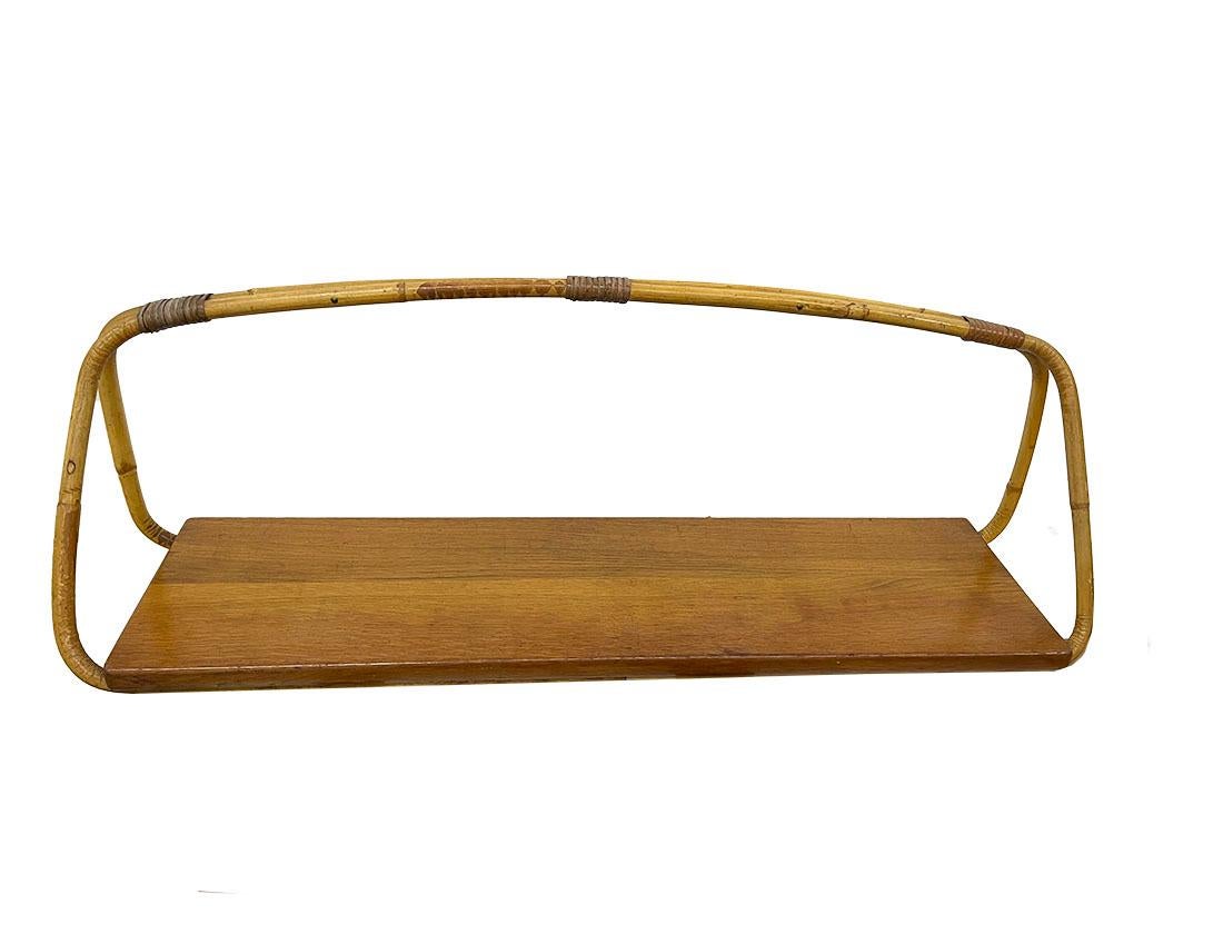 Dutch Rattan children's chair with bookshelf, 1960s For Sale