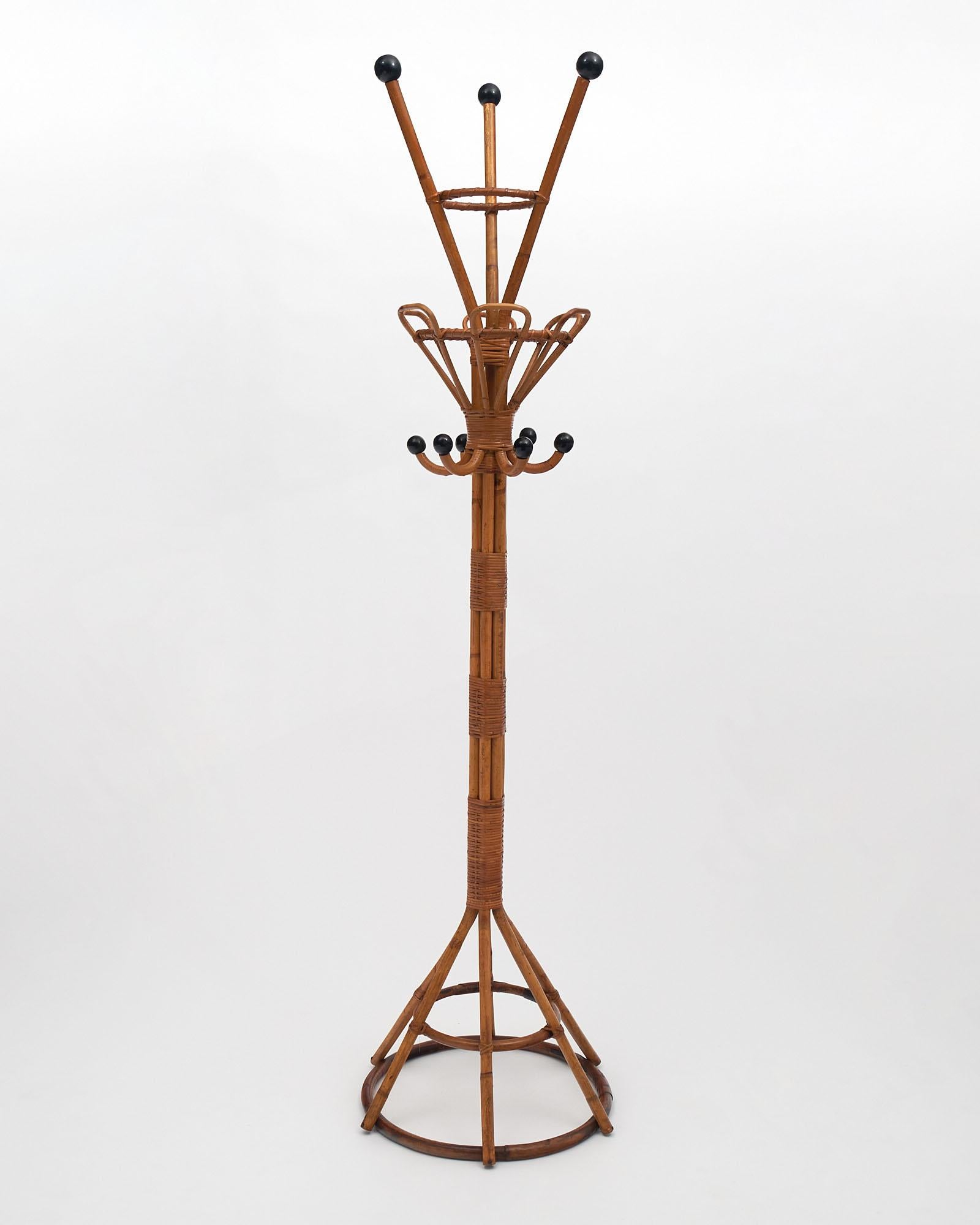 Coat hanger from France made of rattan. This piece, originally from a French Riviera villa, has great height and form.