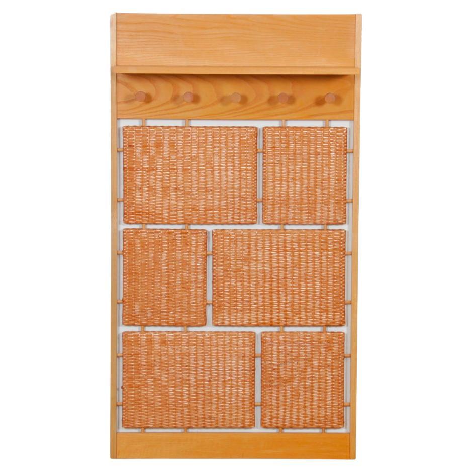 Rattan coat rack published by Uluv in the 1960s