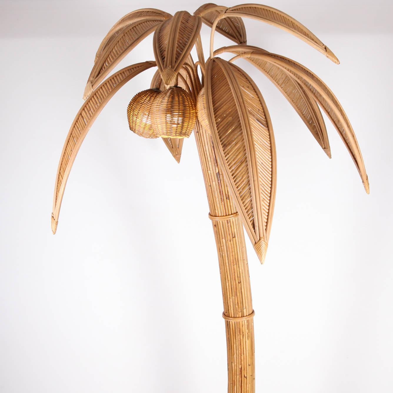 This Handmade rattan coconut tree floor lamp will transform any piece of your place to a warm tropical island vibe. Each comes with 3 bulbs in the coconuts and 10 removable/ adjustable leaves. In the style of Mario Lopez Torres.
*Available in pair*.