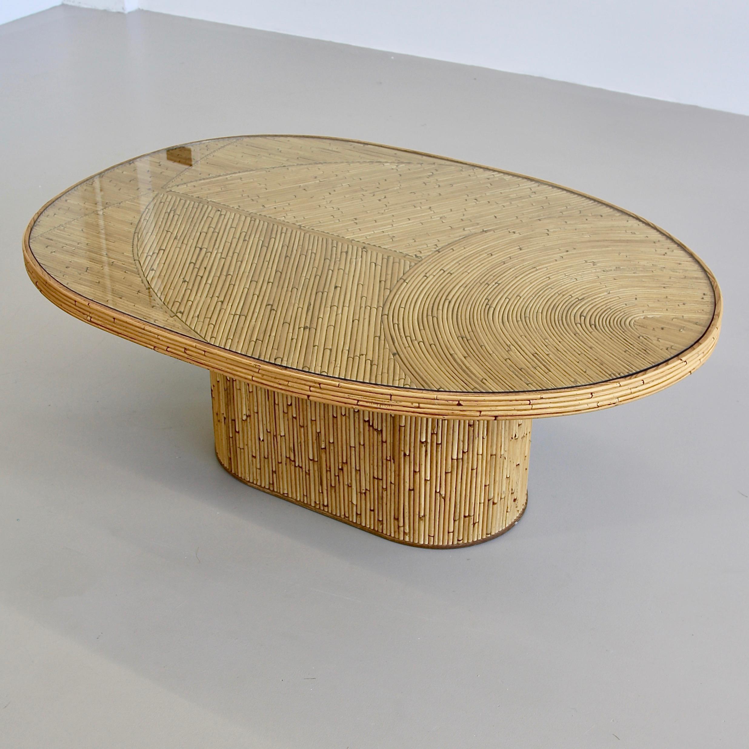 Coffee table designed by India Mahdavi, France, 2017.

Rattan made coffee table with inserted glass top and metal structure, model 'Fish'. Super elegant design! Includes gold-colored stamped label 'India Mahdavi' on the underside.
Condition: