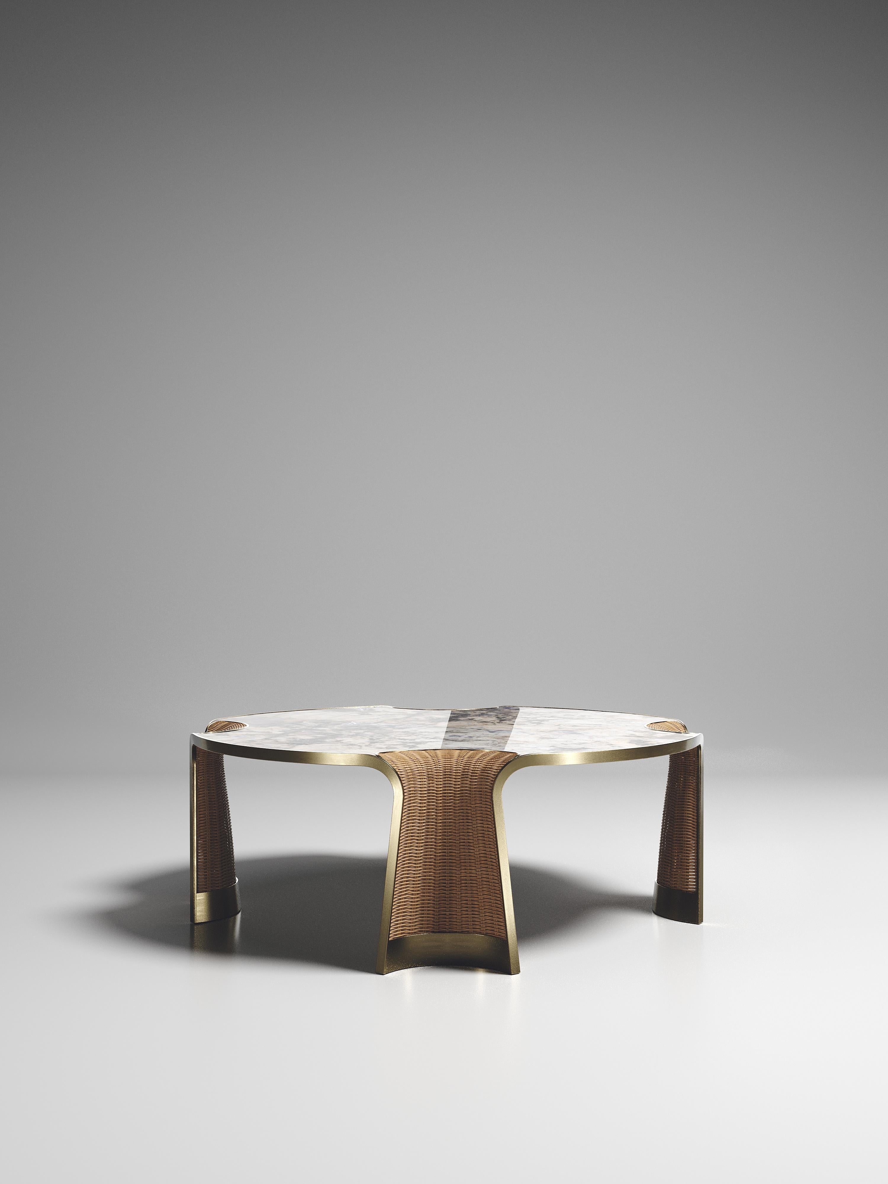 The Nymphea Round Coffee by R & Y Augousti is a part of their new Rattan capsule launch. The piece explores the brand's iconic DNA of bringing old world artisanal craft into a contemporary and utterly luxury feel. This table is done in a natural