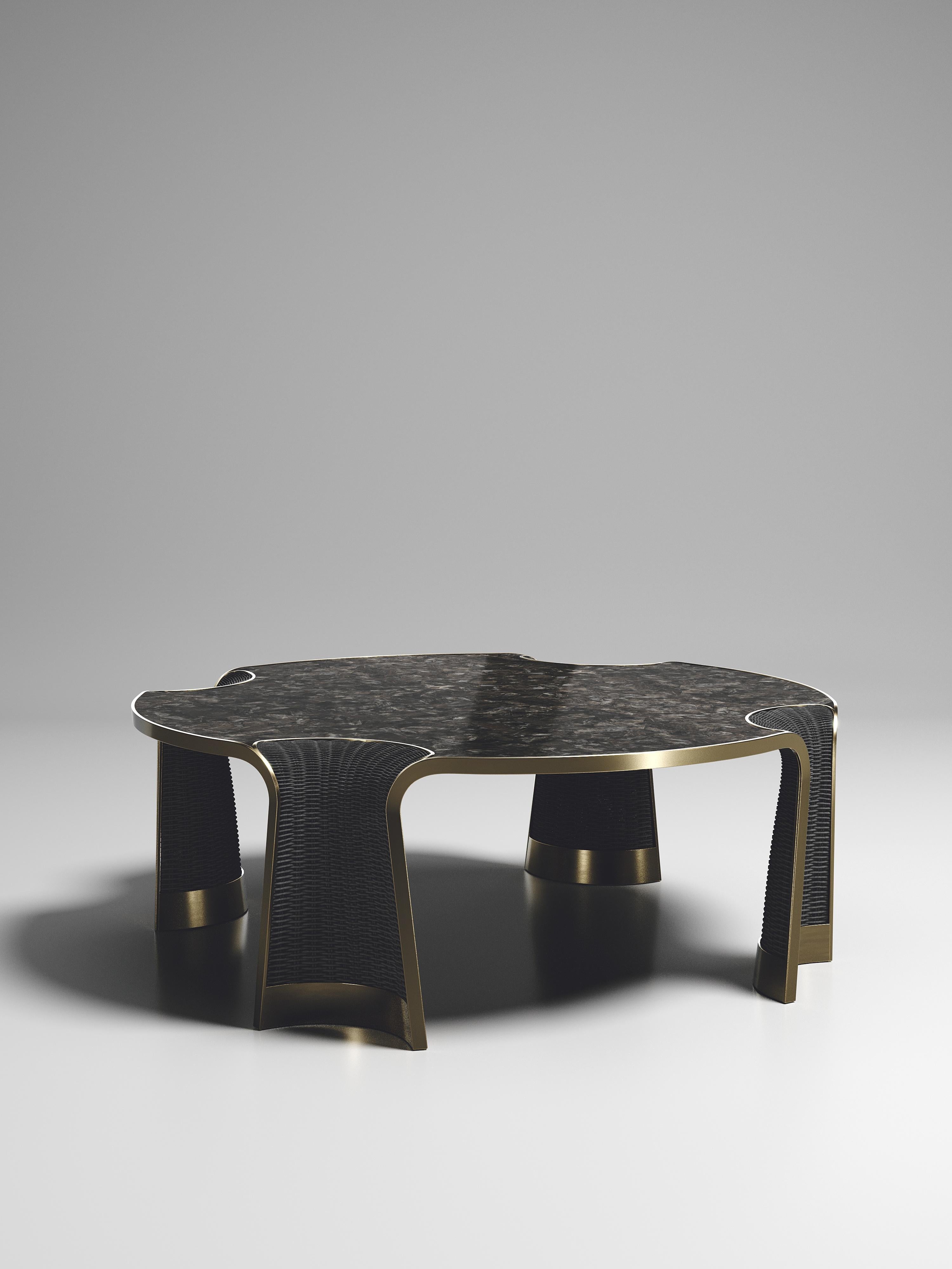 The Nymphea round coffee by R & Y Augousti is a part of their new Rattan capsule launch. The piece explores the brand's iconic DNA of bringing old world artisanal craft into a contemporary and utterly luxury feel. This table is done in a black