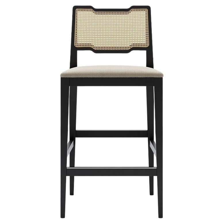 Made to last, the solid wood structure of this counter stool combines the perfect mix of a contemporary design with vintage twist. The detailed woven-work technique on the back promises to make a statement in any room as distinguished as it is. The