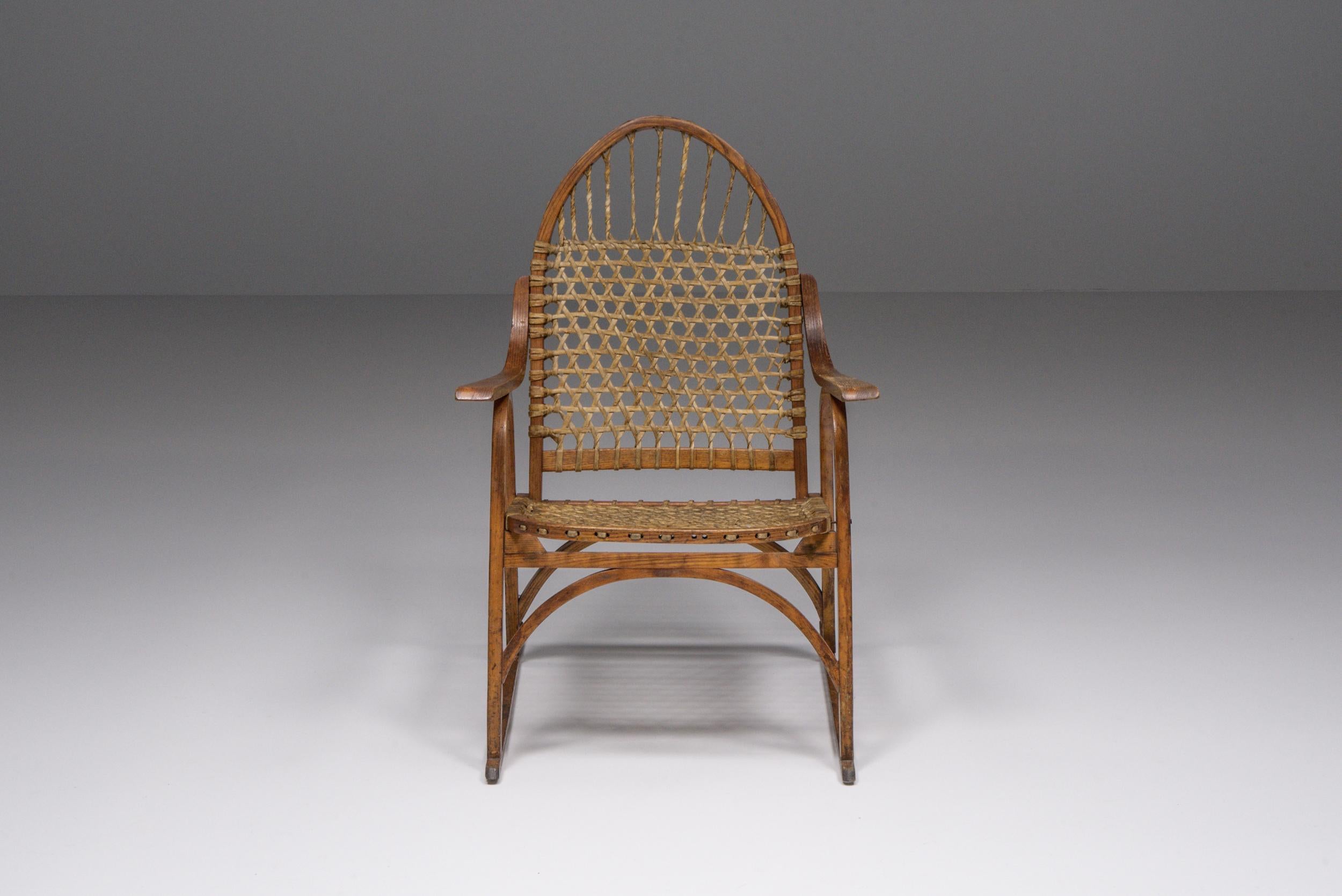 Axel Vervoordt Style; Rattan; Wicker; Mid-Century Modern; France; Craftsman's touch; Organic furniture; 

Wooden chair made of an organic frame with rattan wicker seating and backrest. A craftsman piece, that offers great detail and technique.