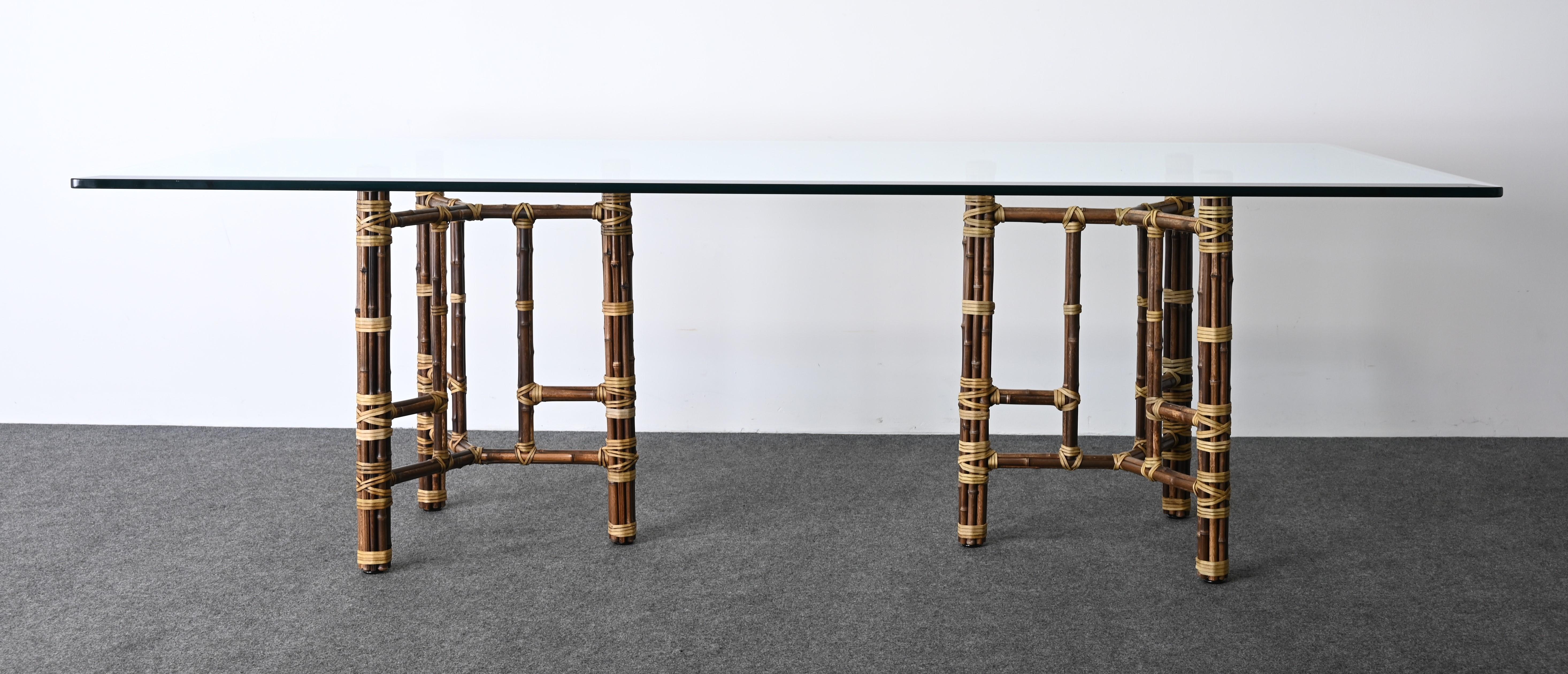 An Organic Modern Rattan dining table by McGuire, 1980s. This simple line classic table would work in any interior. In the aesthetic style of Bunny Williams, Alexa Hampton, and others, as seen in 