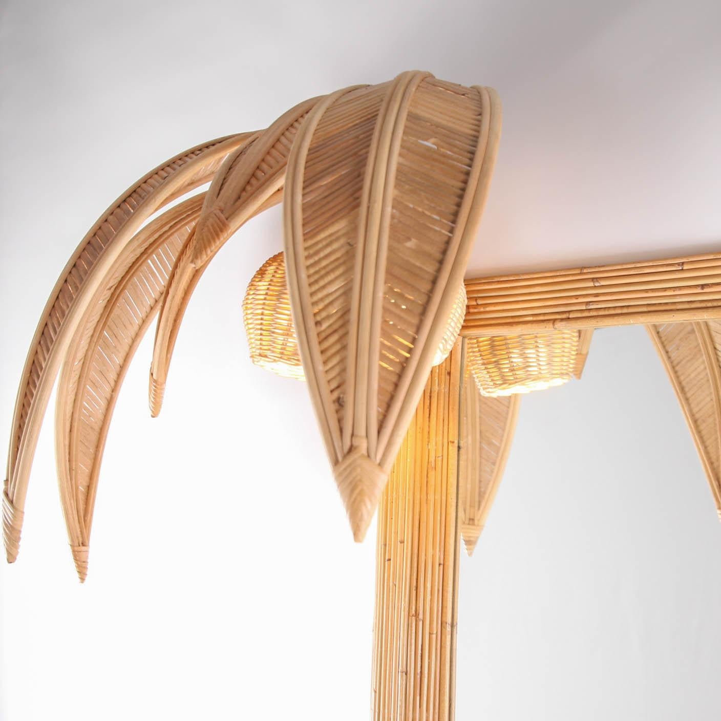 Rare rattan double coconut trees full-length mirror with 4 lights in the coconuts.
In the style of Mario Lopez Torres, Vivai del Sud, Maison Jansen.