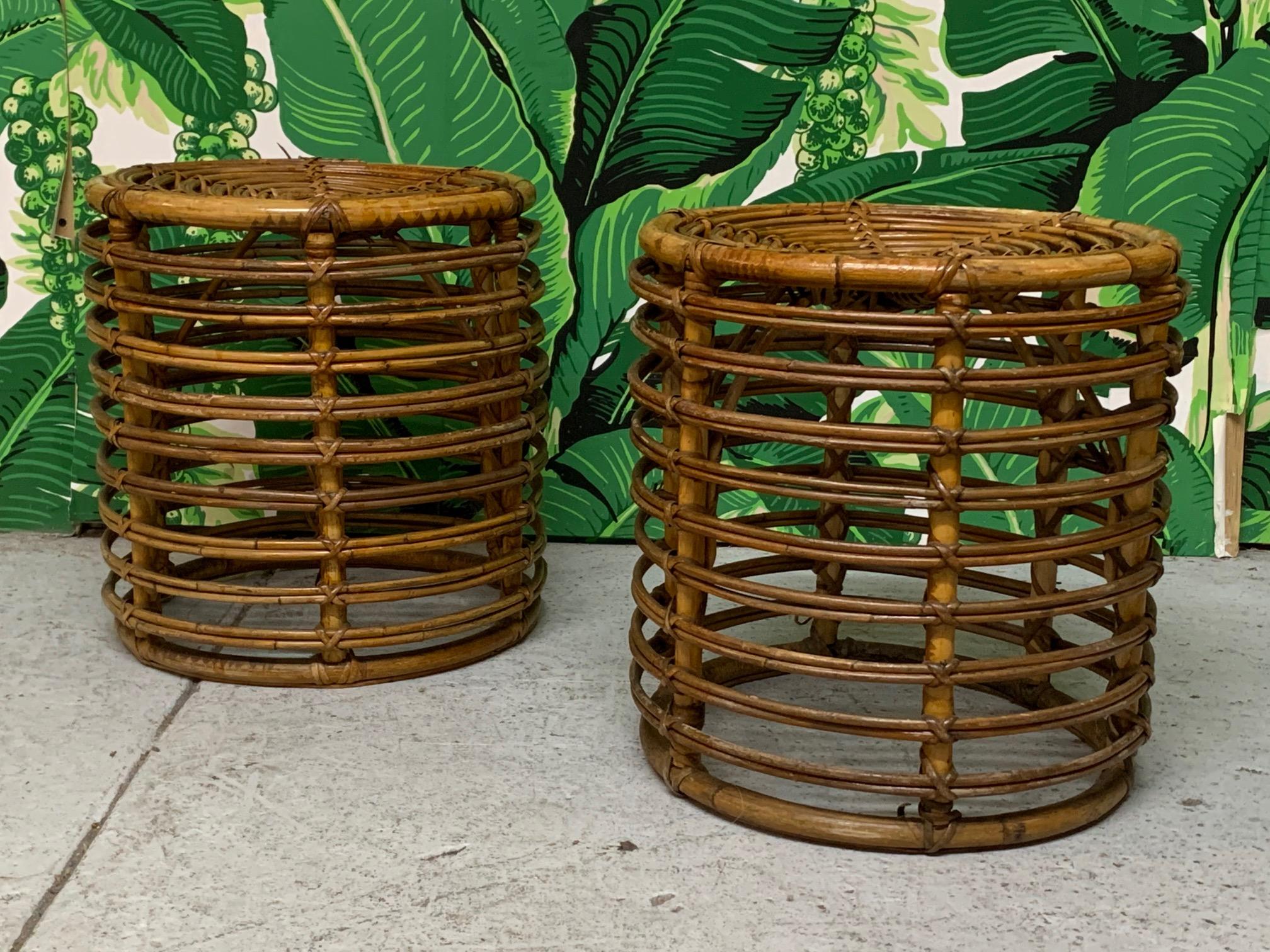 Pair of stacked rattan drum shaped side / end tables could also be used as footstools. Very good vintage condition with minor imperfections consistent with age.
