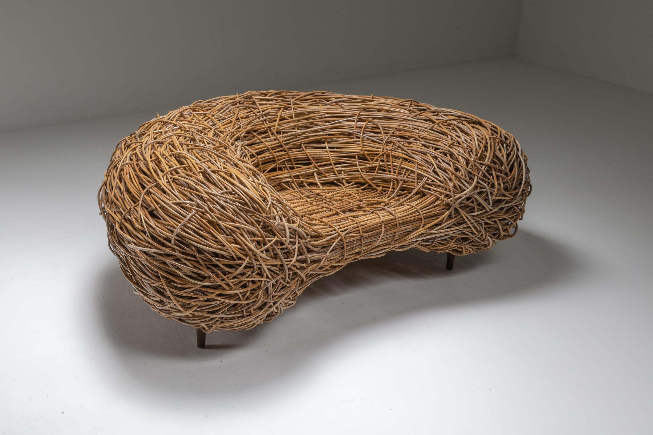 Bird's nest easy chair in rattan 

Attributed to artist designer Porky Hefer.
For South African designer Porky Hefer, architects and designers have much to learn from nature, in particular nests which have been inspiring the sculptural seating