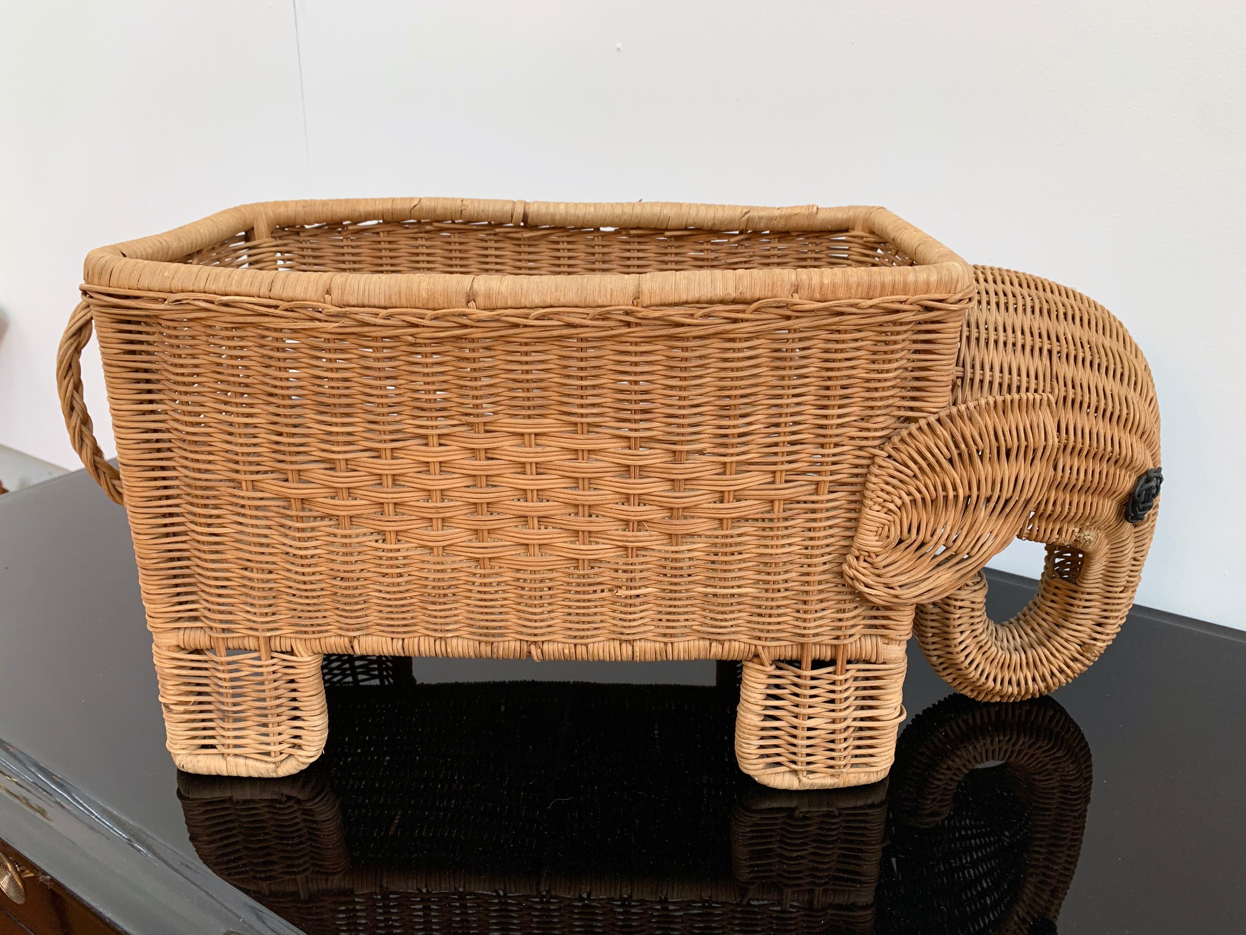 Rattan elephant magazine rack, newspaper holder or also plant holder.