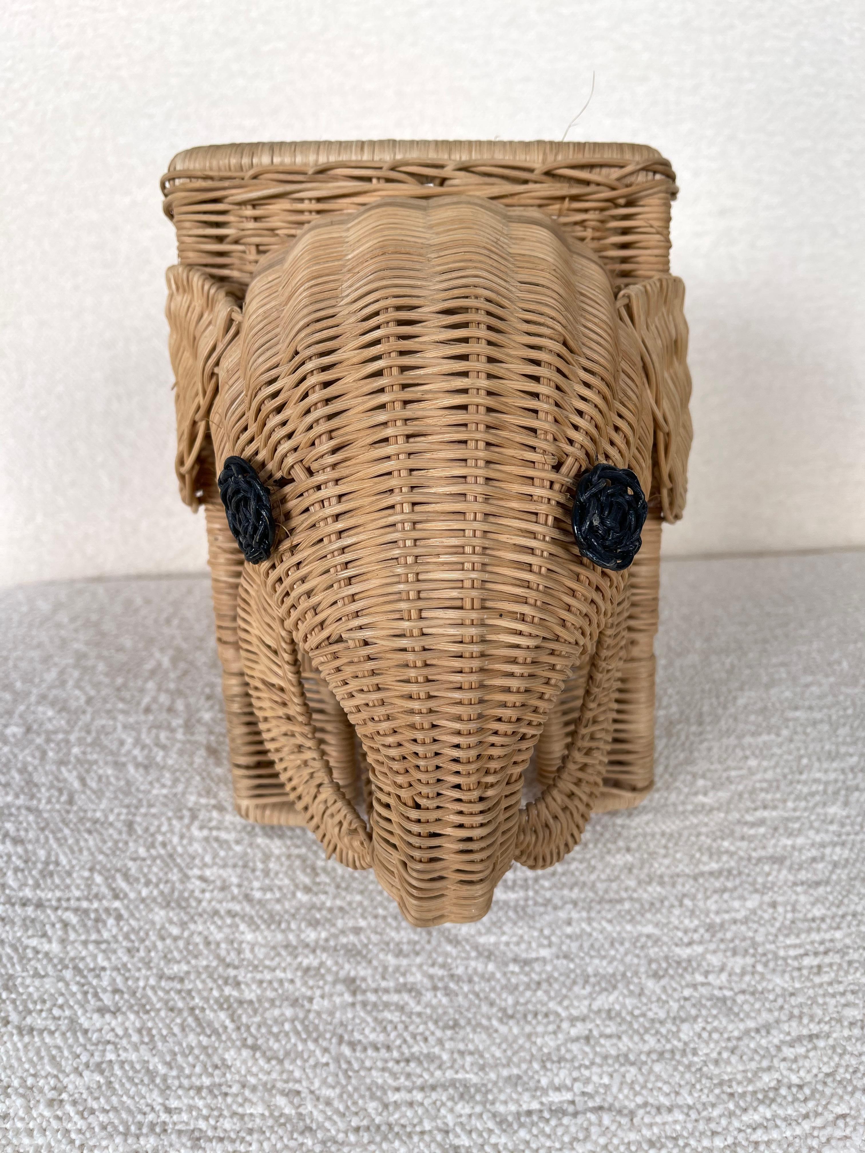 Rattan elephant magazine rack, newspaper holder or also plant holder or basket.