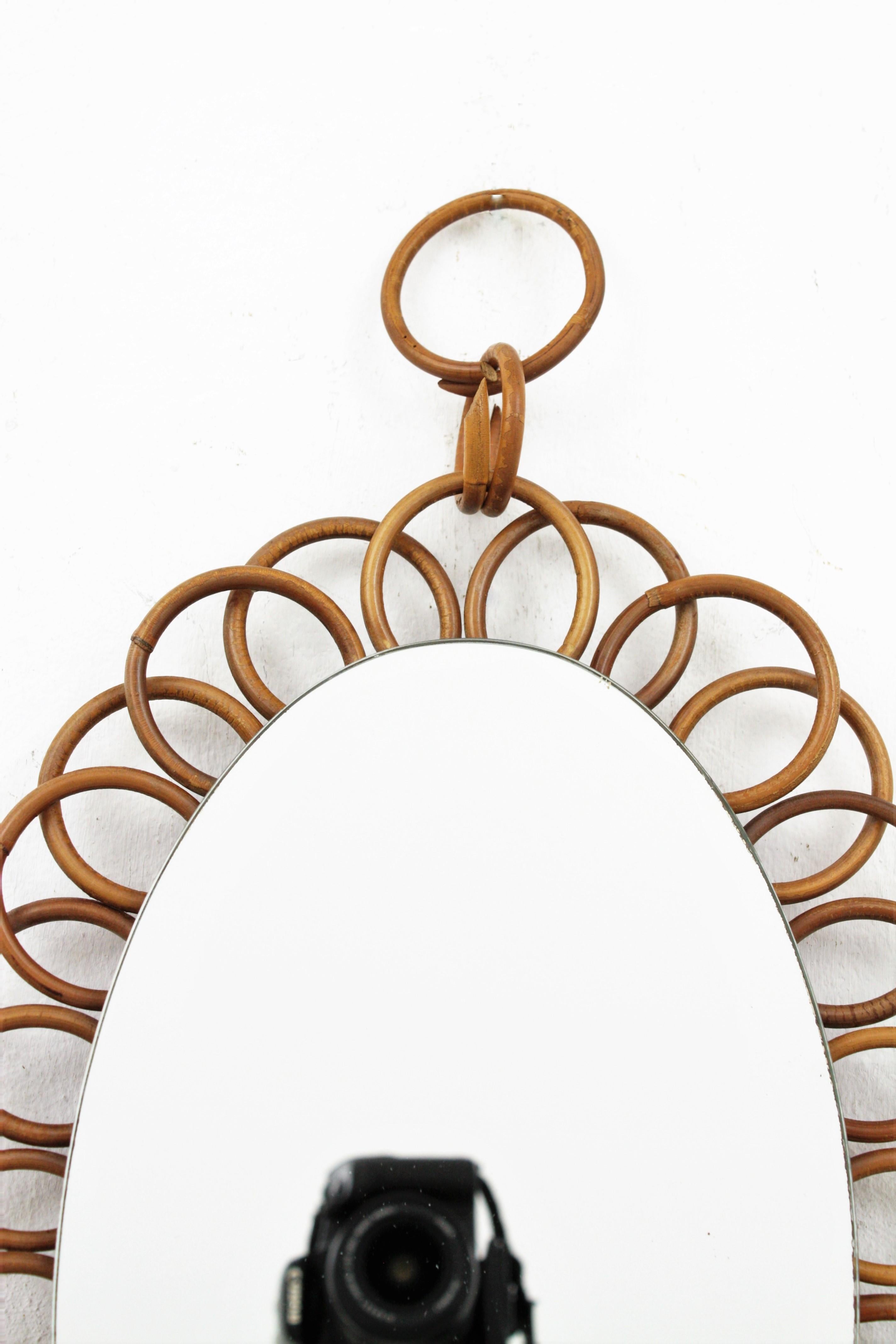 20th Century French Rattan Oval Shaped Hanging Mirror For Sale