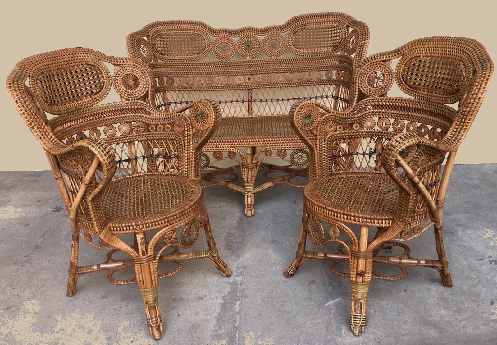 French winter garden furniture set, work of the Maison Perret Vibert, including two armchairs, four chairs, a table and a sofa, second half of the 19th century.
In polychrome tinted rattan, each piece with a sheet metal plate inscribed 