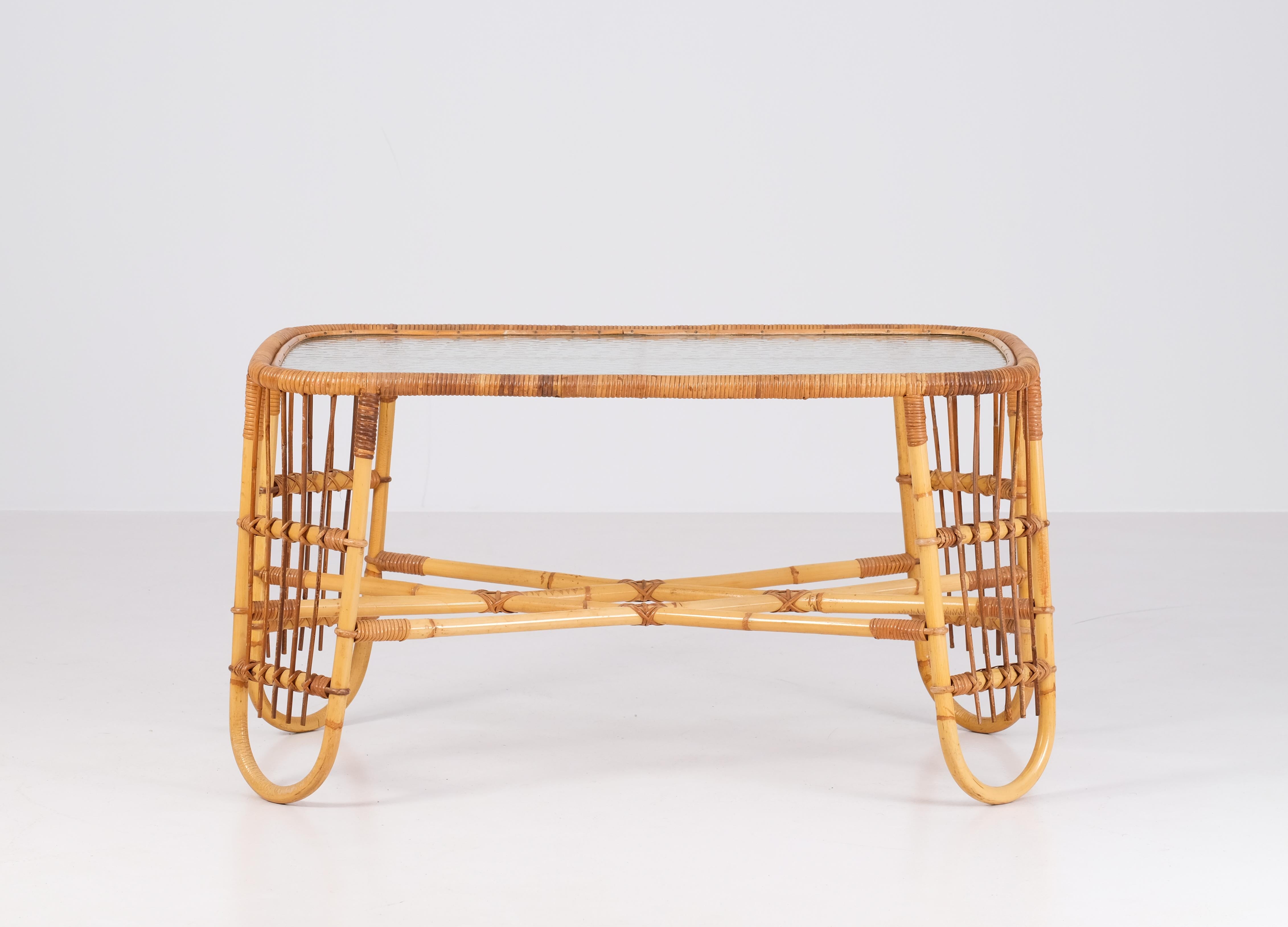 Produced by E.V.A. Nissen & Co in Denmark.
Rattan, cane and glass.