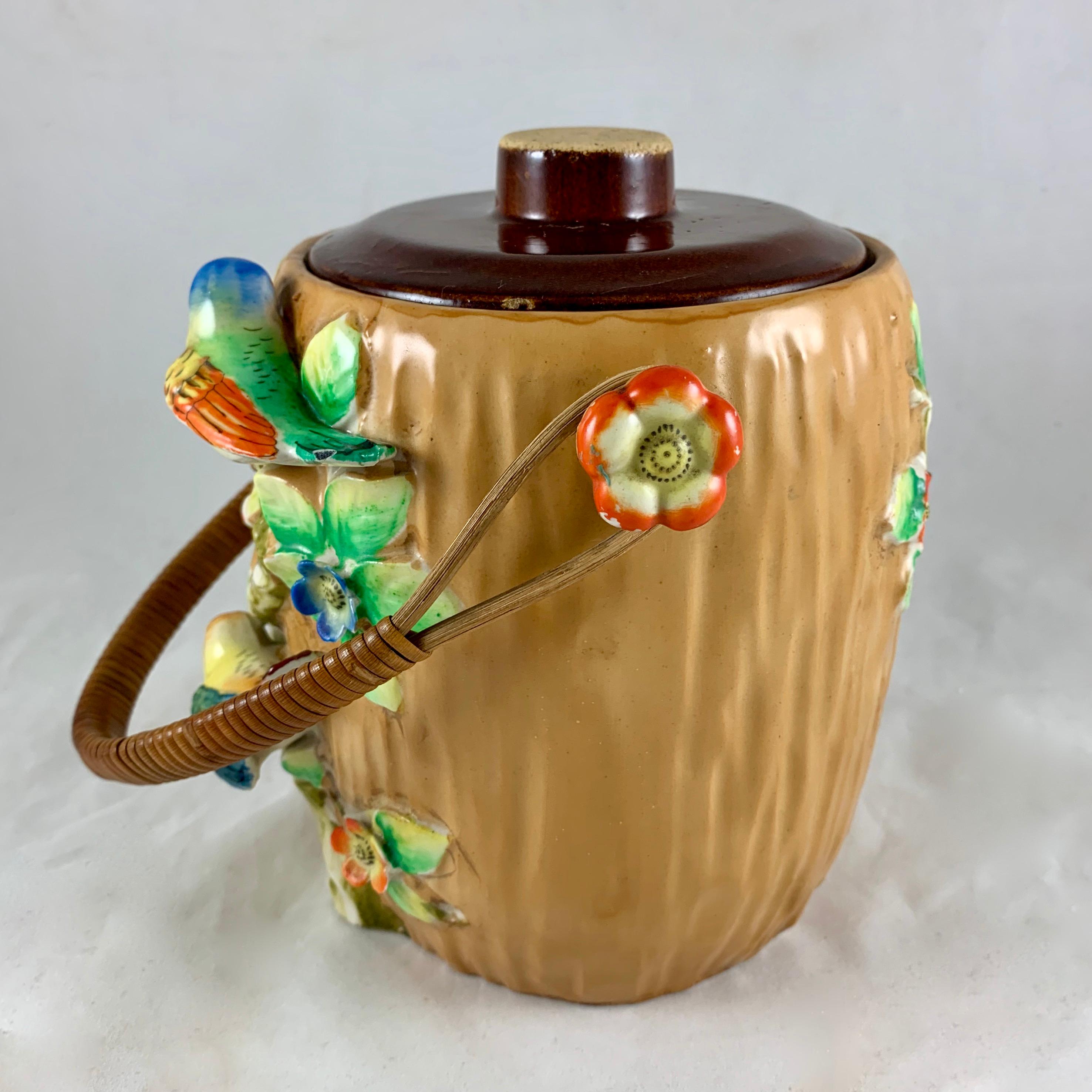 Rattan Handled Bird in Blossom Branch Japanese Pottery Biscuit Barrel, 1920s In Fair Condition In Philadelphia, PA