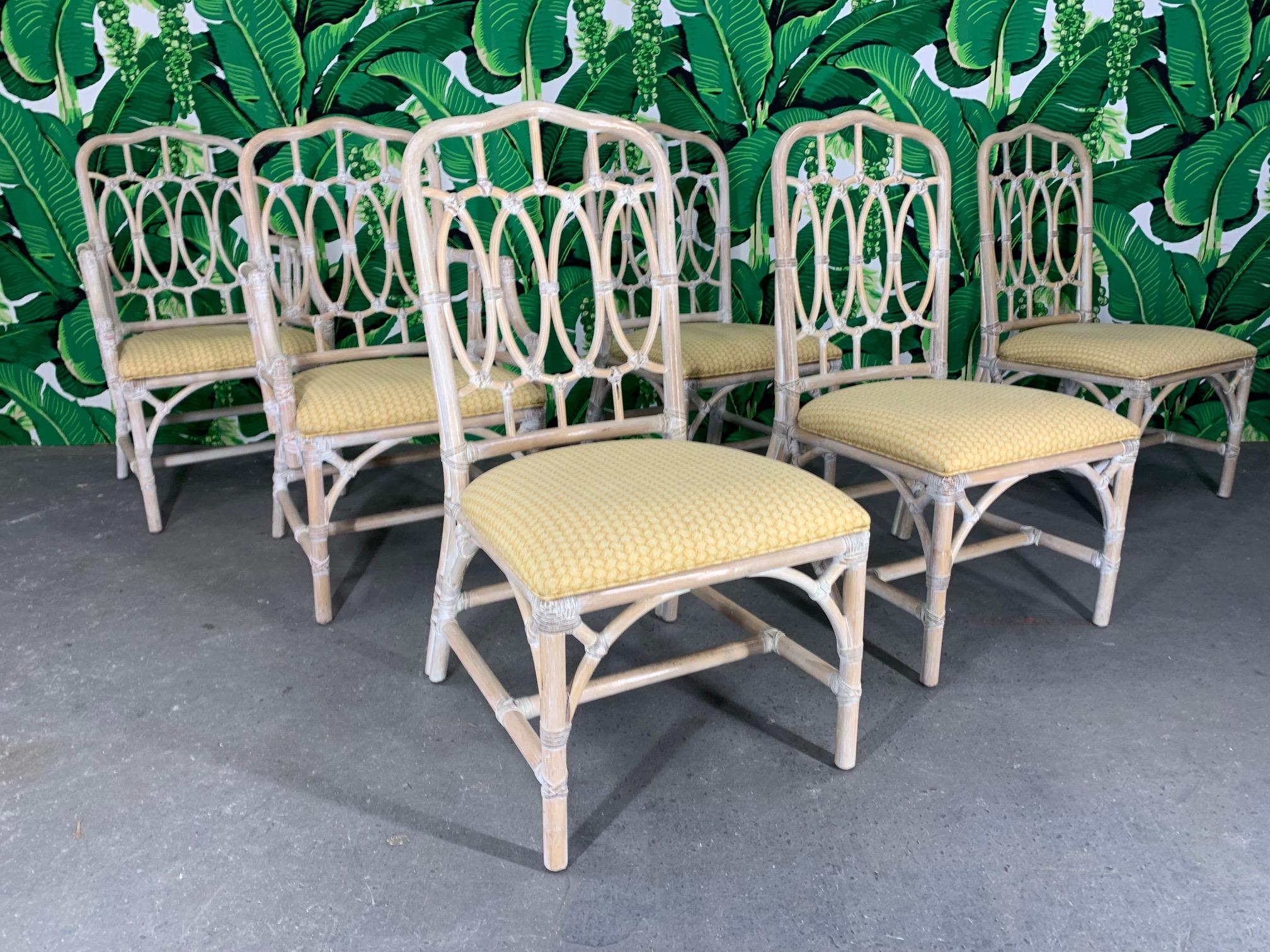 Set of 6 vintage rattan dining chairs by Lexington Furniture Co. featuring an attractive loop-back design. Very good condition with only minor imperfections consistent with age. Seat height measures 17.5