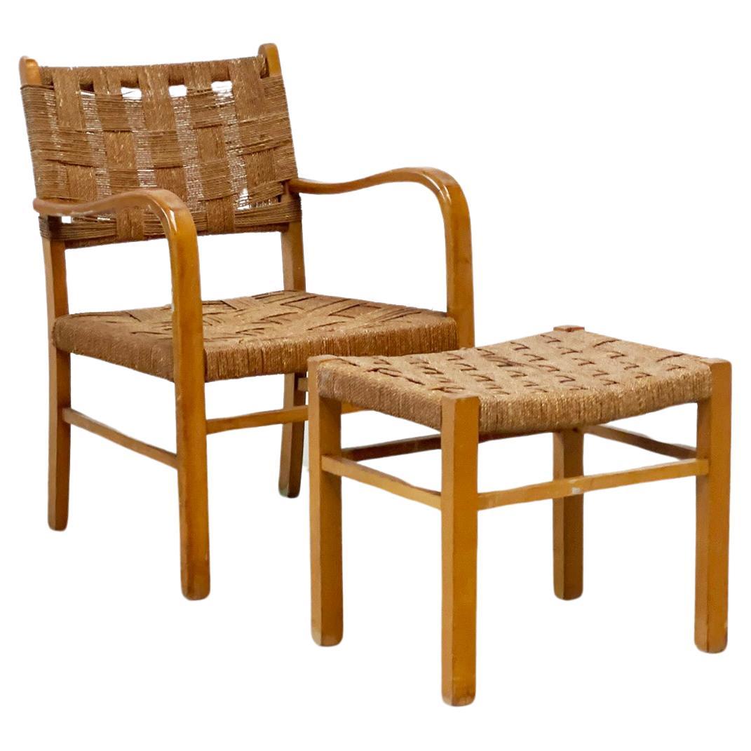 Rattan lounge chair and ottoman with rattan seat For Sale