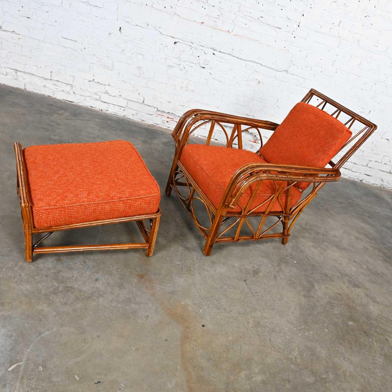 Marvelous vintage rattan lounge chair and ottoman by Helmers Manufacturing Company with spring seat and ottoman cushions and nubby orange fabric. Beautiful condition, keeping in mind that these are vintage and not new so will have signs of use and