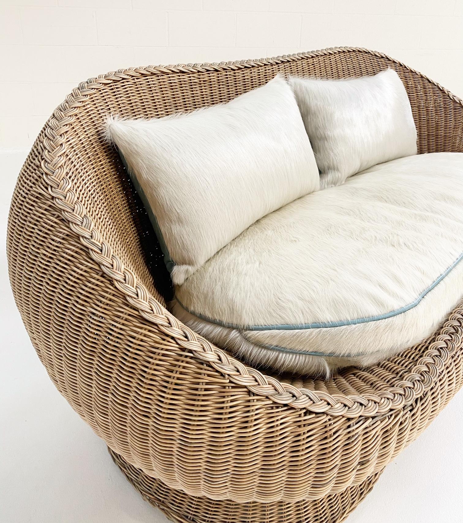 In the style of Eero Aarnio. 

The romance of rattan! Homey, versatile, and always stylish. This loveseat is part of a 10-piece set but we have decided to sell the pieces separately. 

For the loveseat, we created a custom Brazilian ivory
