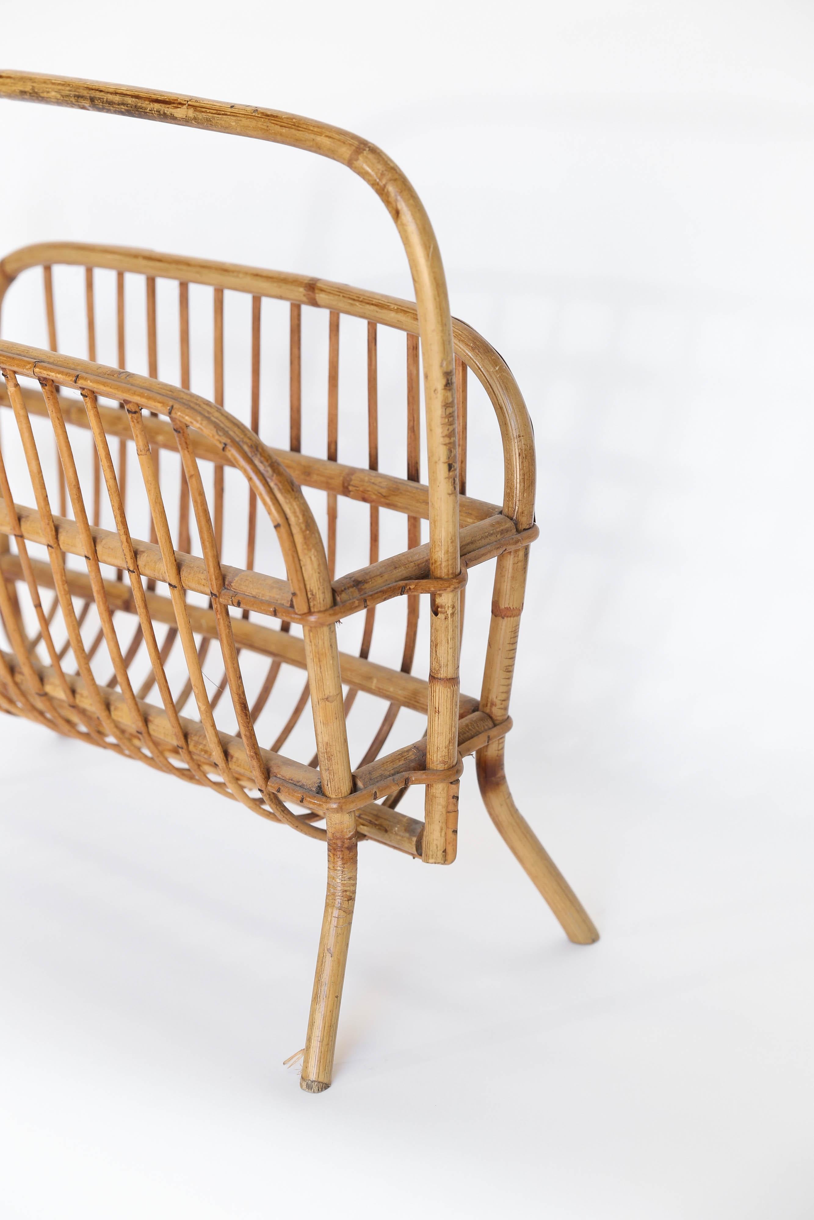 A charming rattan magazine holder for today's style. A functional and contemporary piece.