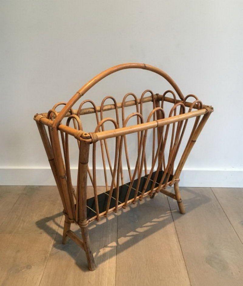 This nice design magazine rack is made of rattan. This is a French work. Circa 1950