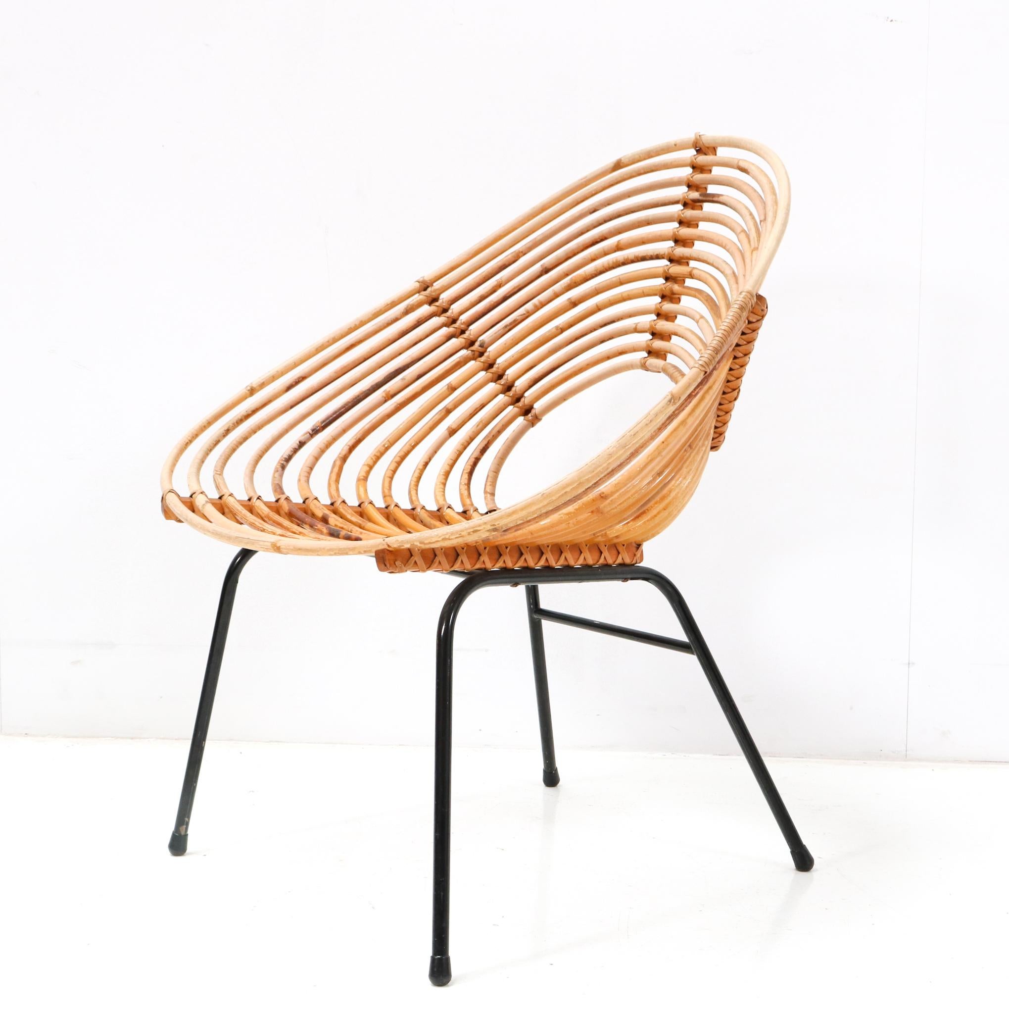 Dutch Rattan Mid-Century Modern Lounge Chair by Dirk van Sliedregt for Rohe, 1950s For Sale