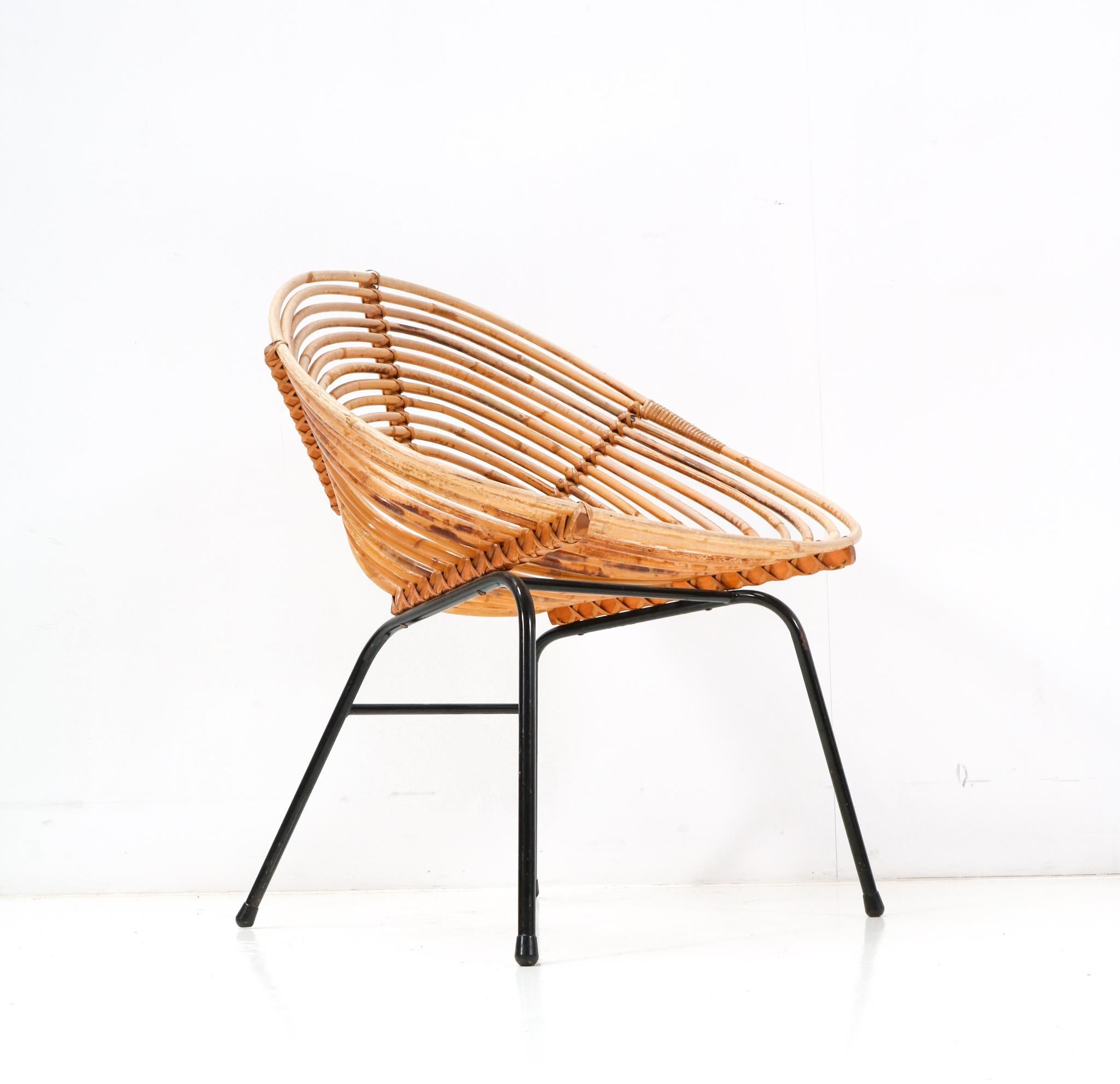 Dutch Rattan Mid-Century Modern Lounge Chair by Dirk van Sliedregt for Rohe, 1950s For Sale