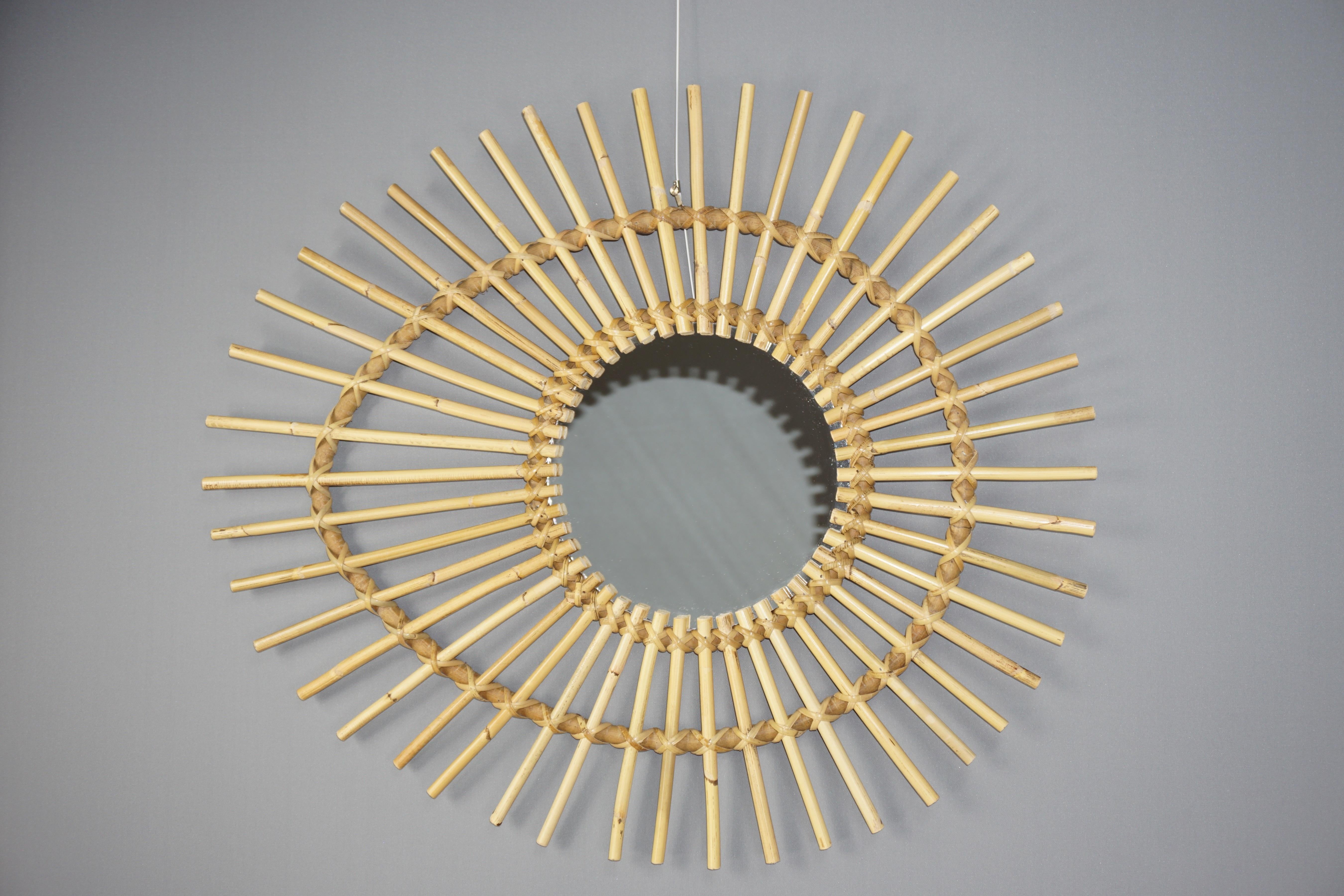 Rattan mirror almond shaped.