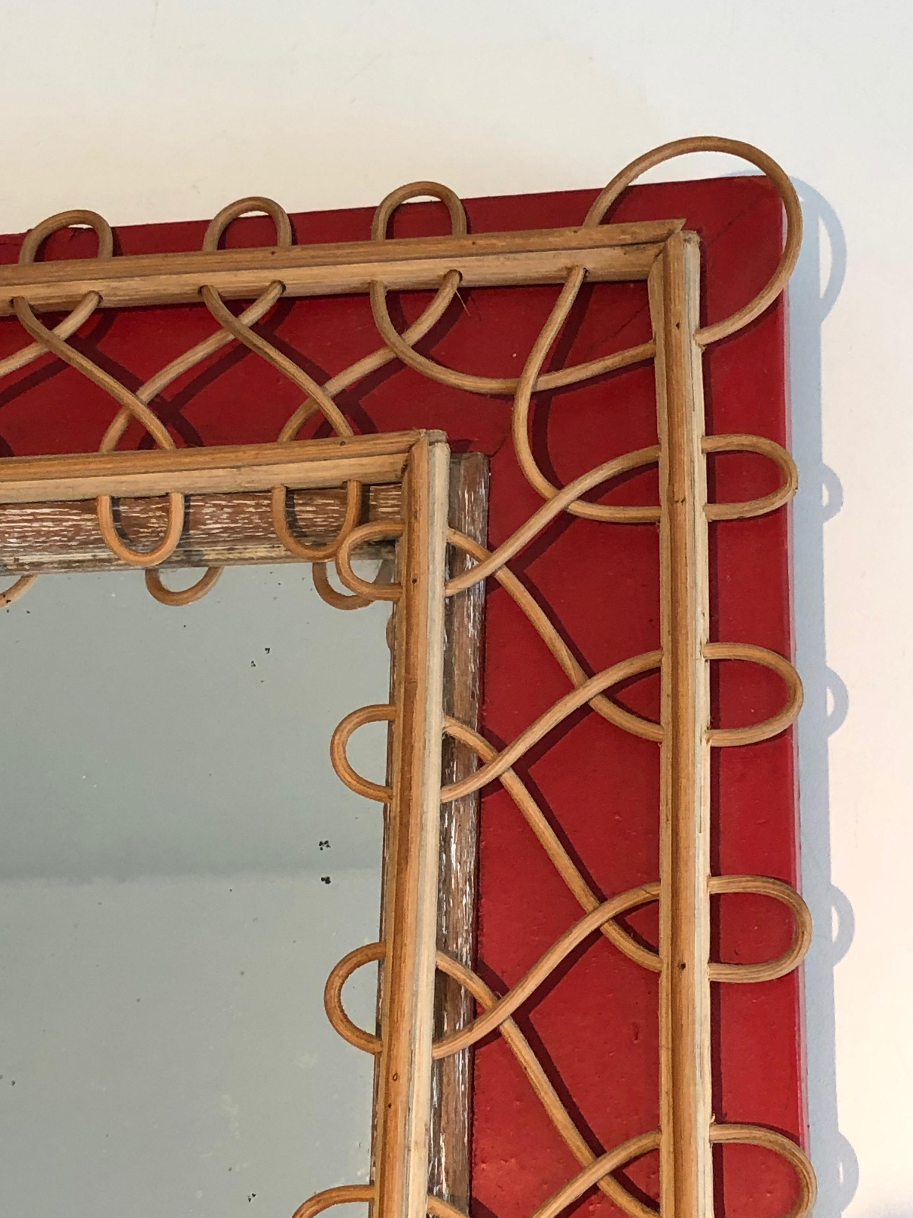 Miroir en rotin sur fond rouge. Travail français. Circa 1940 en vente 7