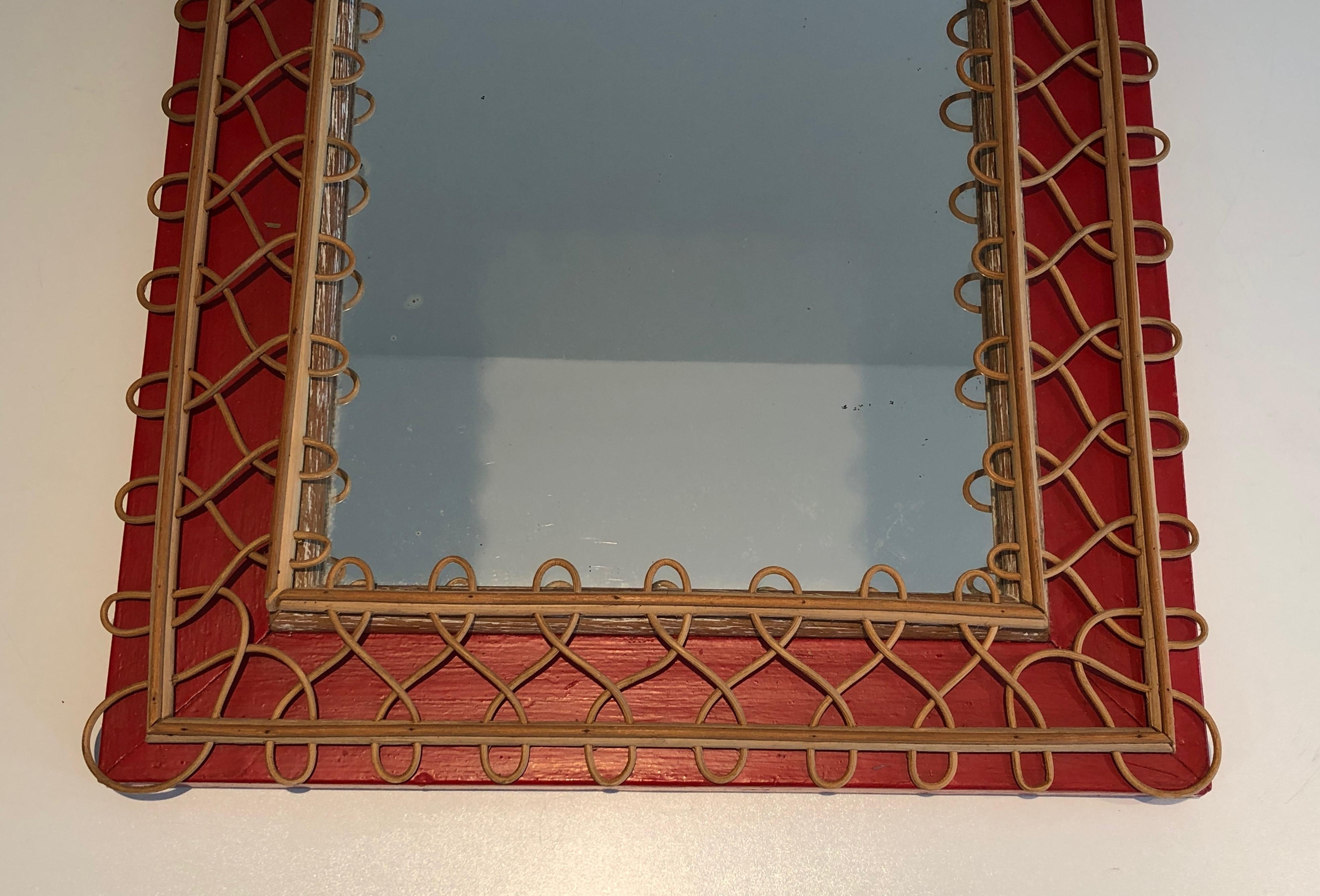 Miroir en rotin sur fond rouge. Travail français. Circa 1940 en vente 10