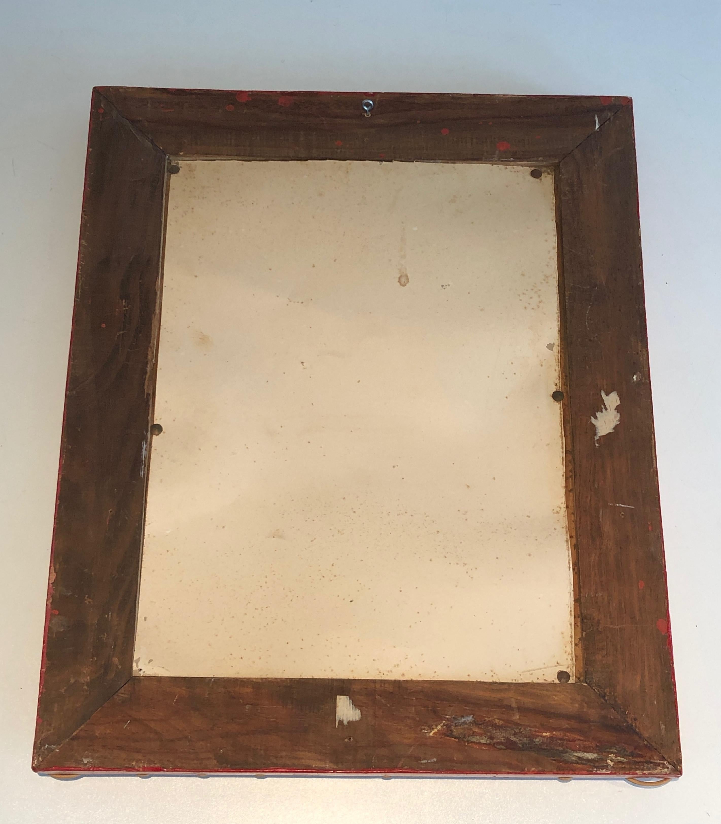 Miroir en rotin sur fond rouge. Travail français. Circa 1940 en vente 11