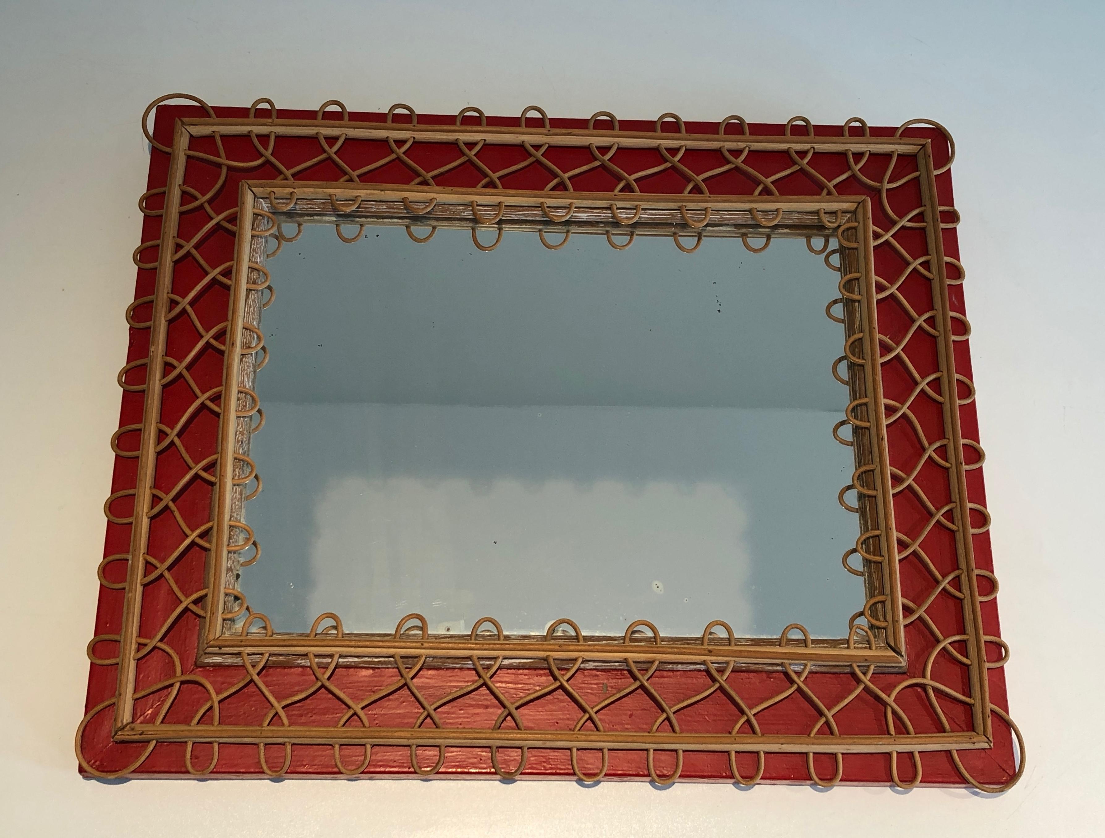 Miroir en rotin sur fond rouge. Travail français. Circa 1940 en vente 12