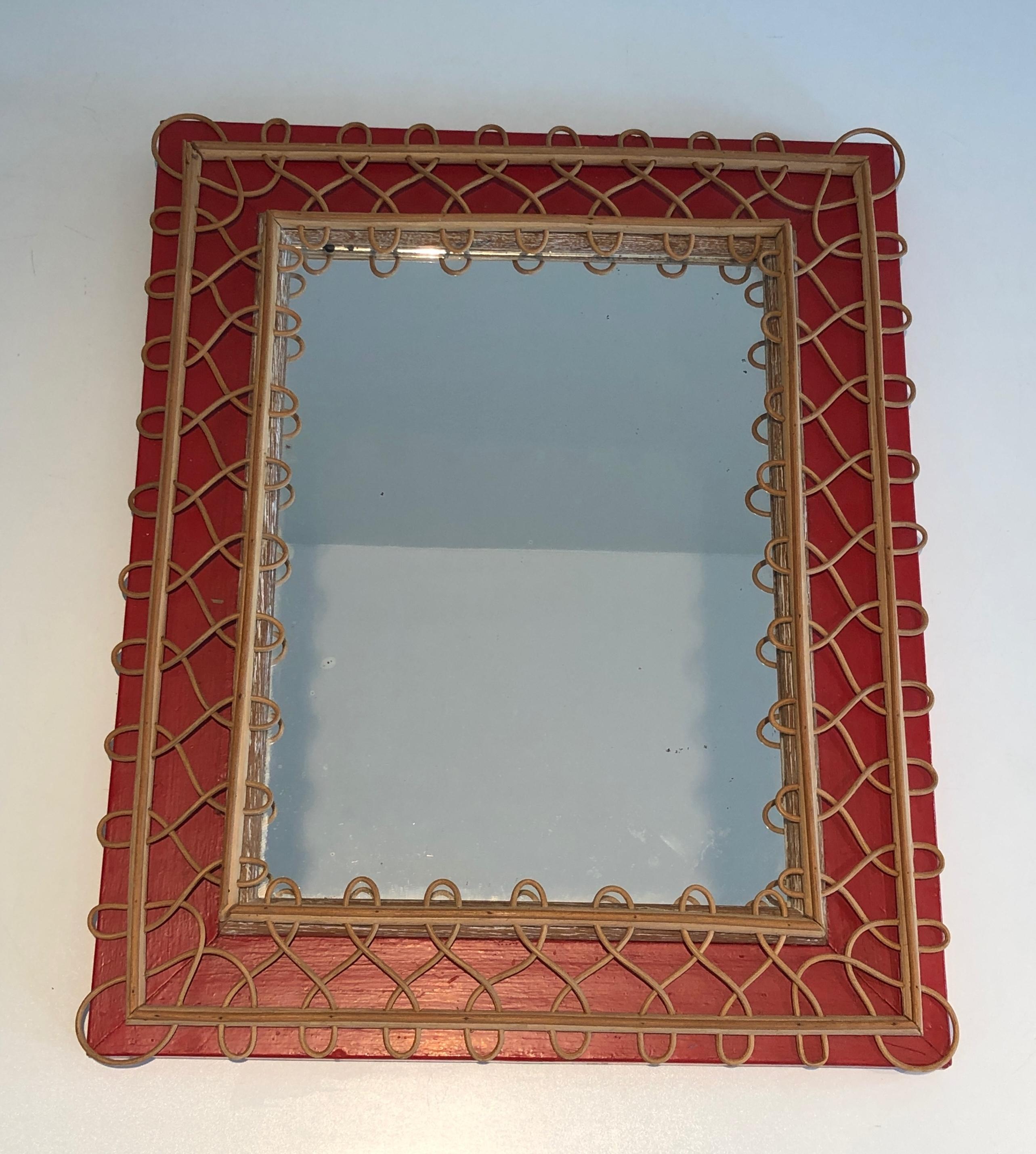 Miroir en rotin sur fond rouge. Travail français. Circa 1940 en vente 13