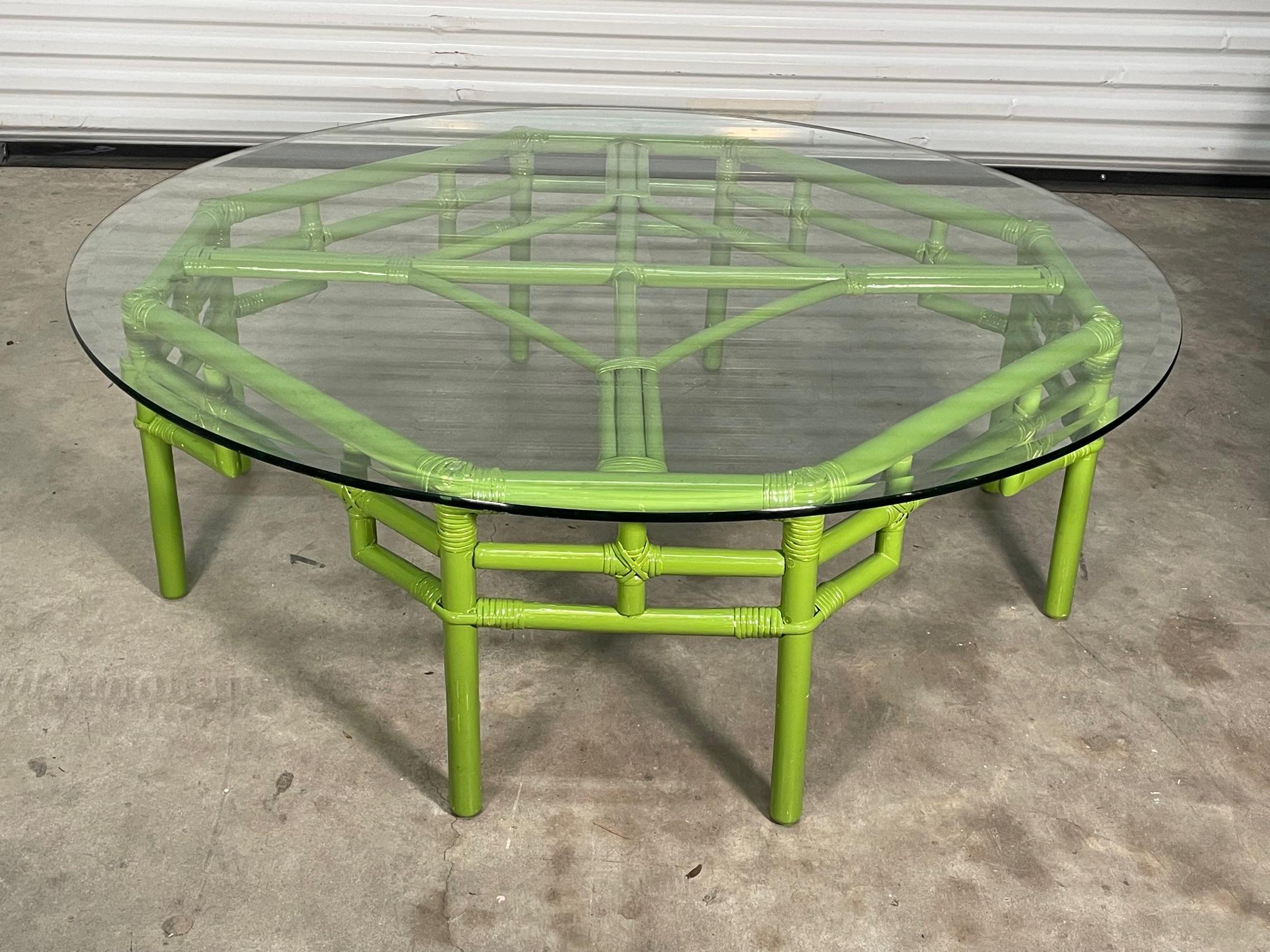 Vintage rattan coffee/cocktail table features a high gloss green finish and a 1/2