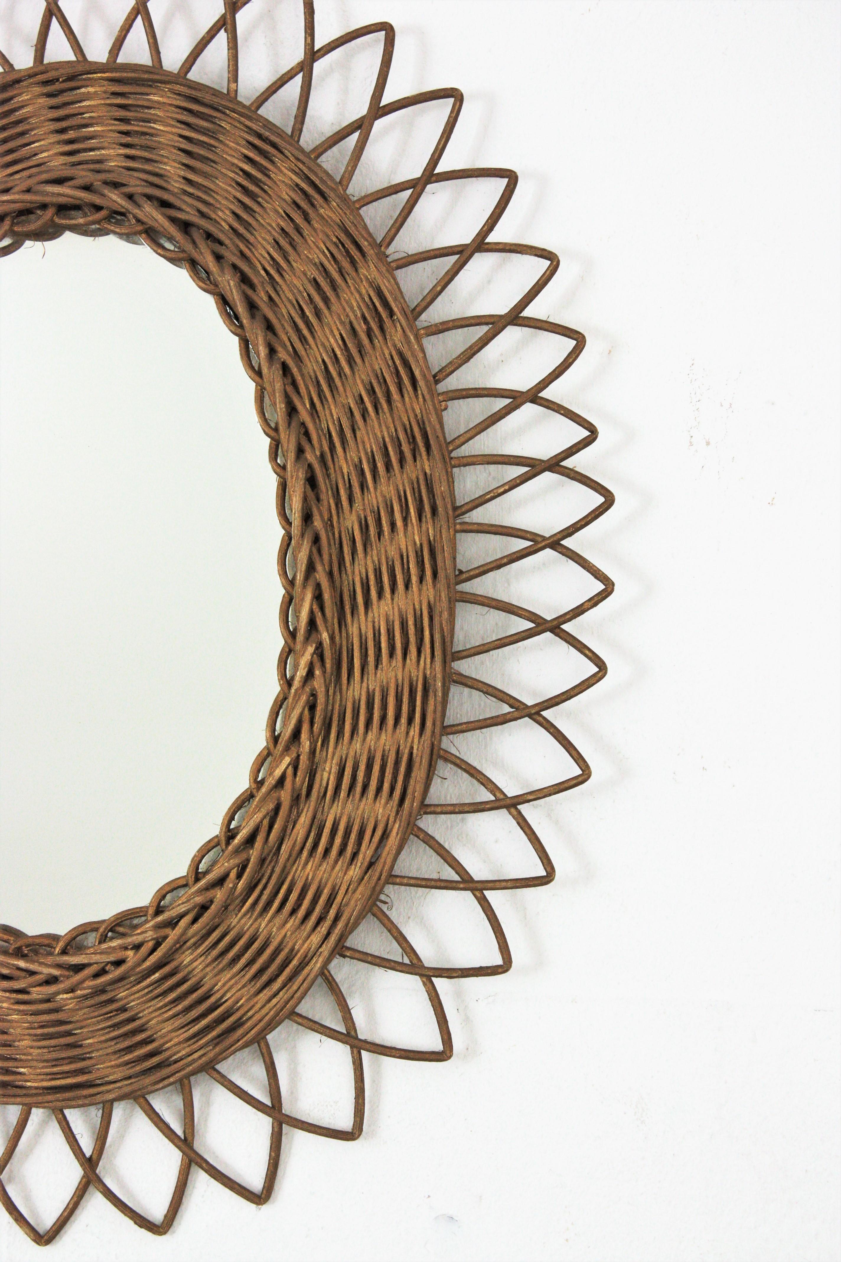 Hand-Crafted Rattan Oval Sunburst Mirror with Gold Paint For Sale
