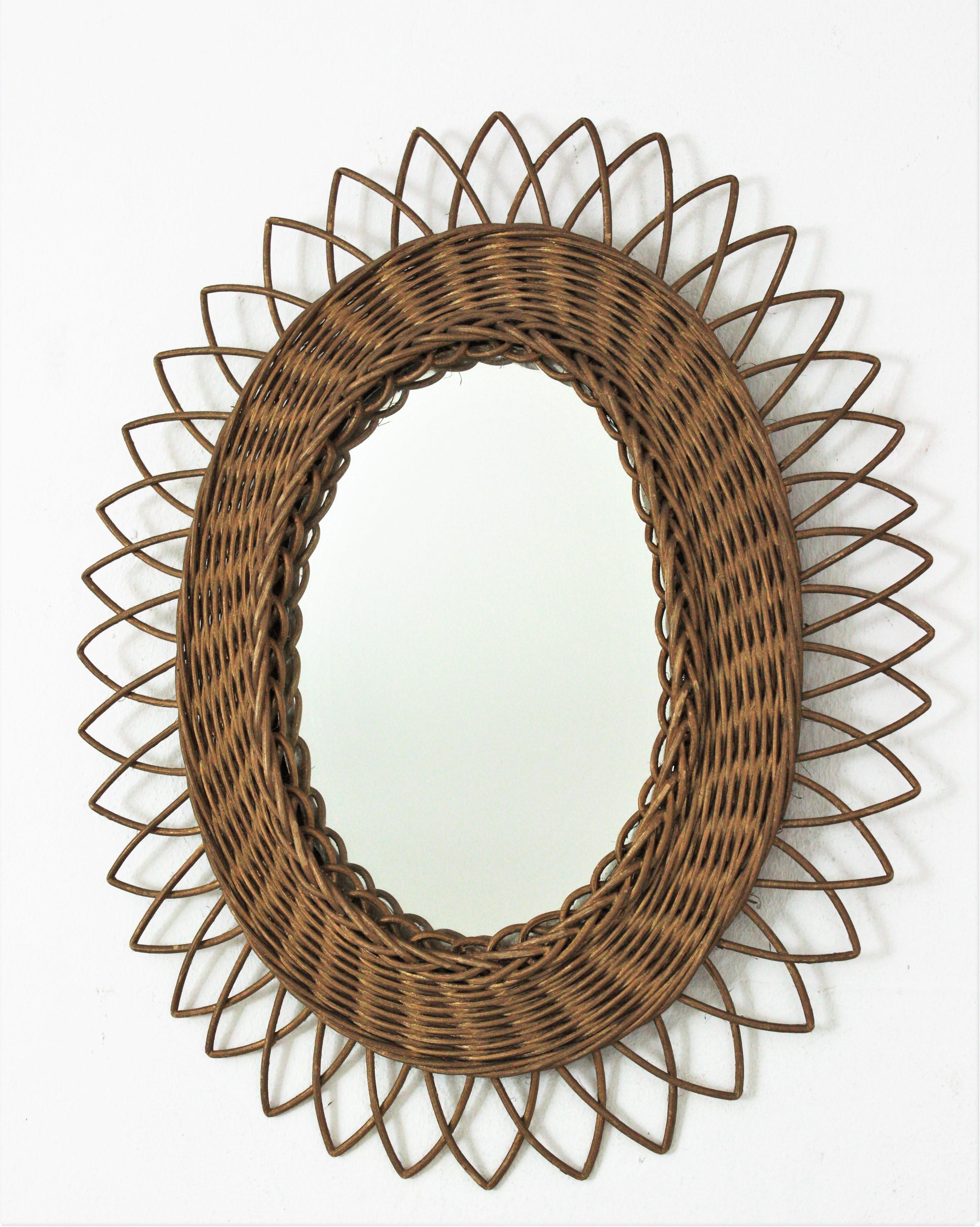 Rattan Oval Sunburst Mirror with Gold Paint For Sale 1