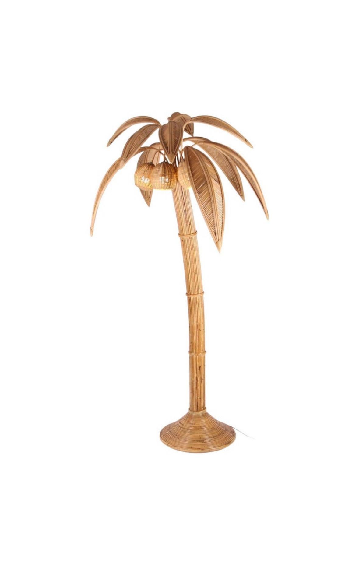 Amazing rattan floor lamp with ten adjustable palms and lights in the 3 coconuts.
Very decorative, this floor lamp is a promise of holidays and sun.
High quality work, all hand made, excellent condition. 