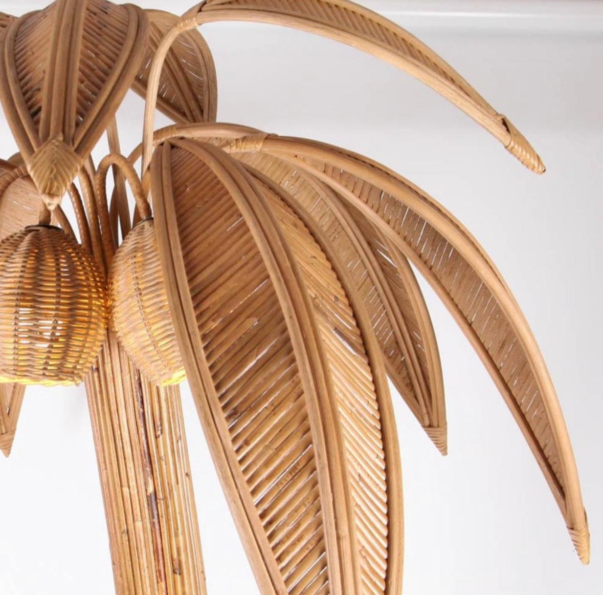 Amazing rattan floor lamp with ten adjustable palms and lights in the 3 coconuts.
Very decorative, this floor lamp is a promise of holidays and sun.
High quality work, all hand made, excellent condition. 
