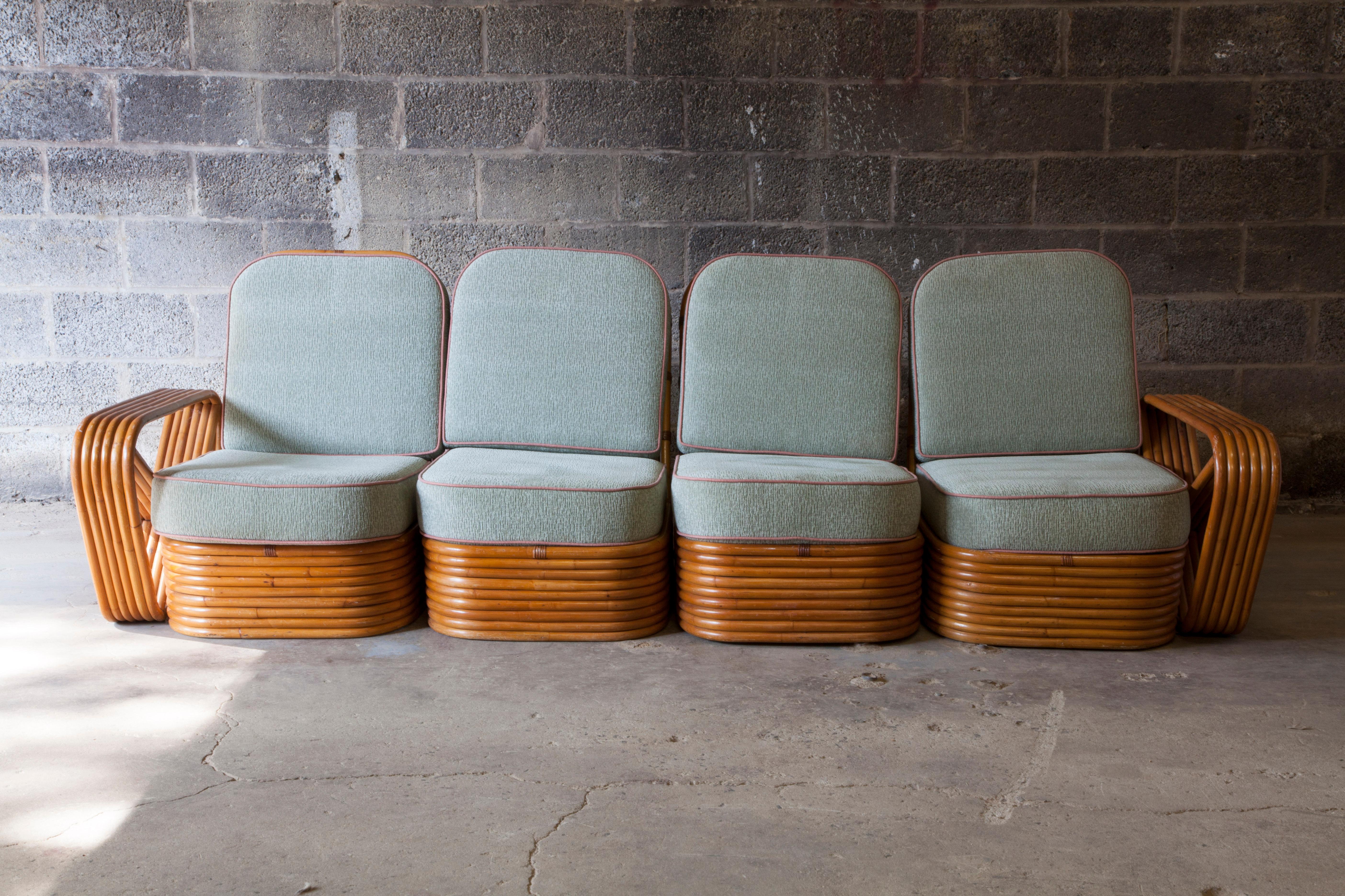A rattan Paul Frankl style pretzel sofa. Sections are individual and can be separated. Original upholstery.